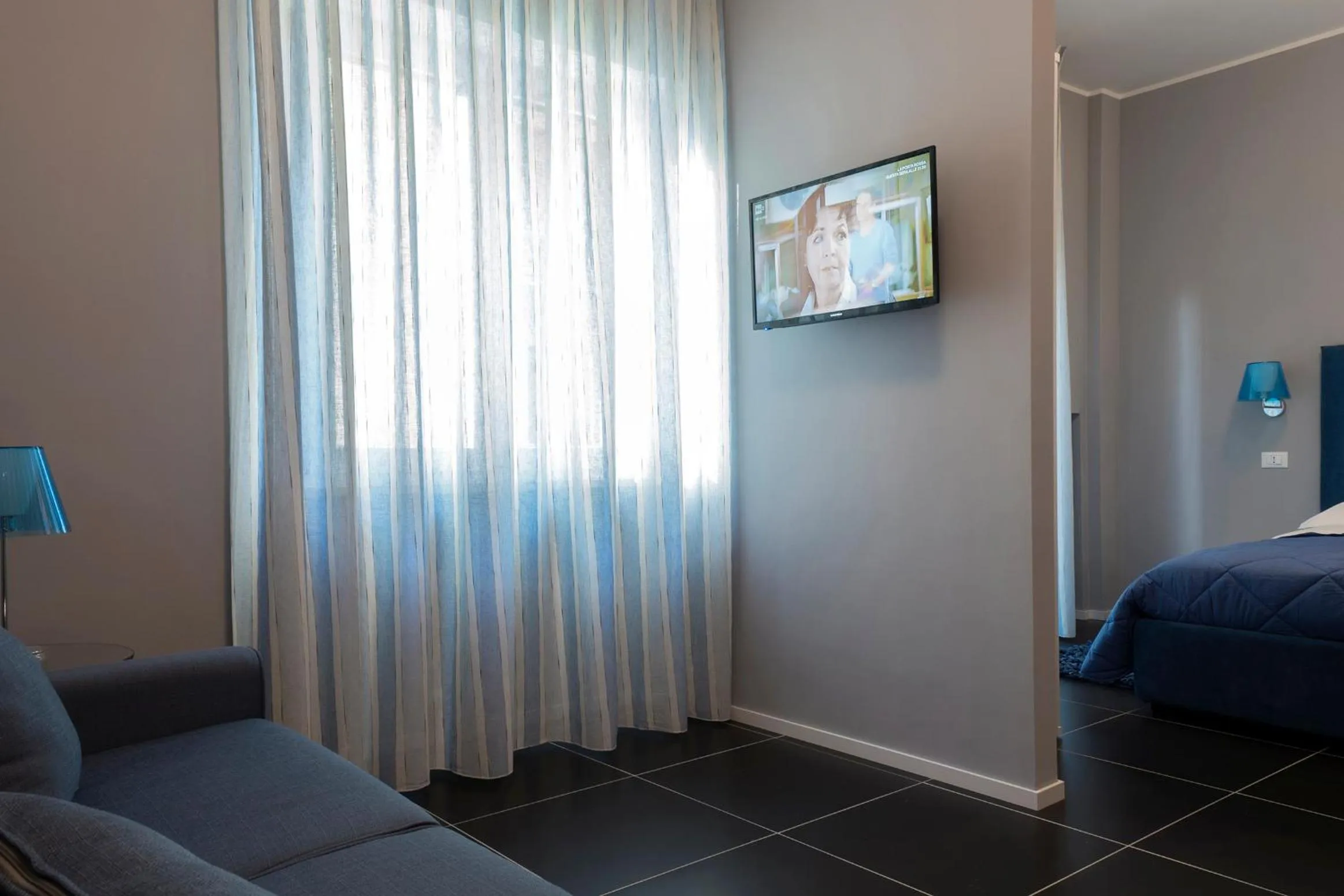 Living room, Bed in B&B L’Angolino