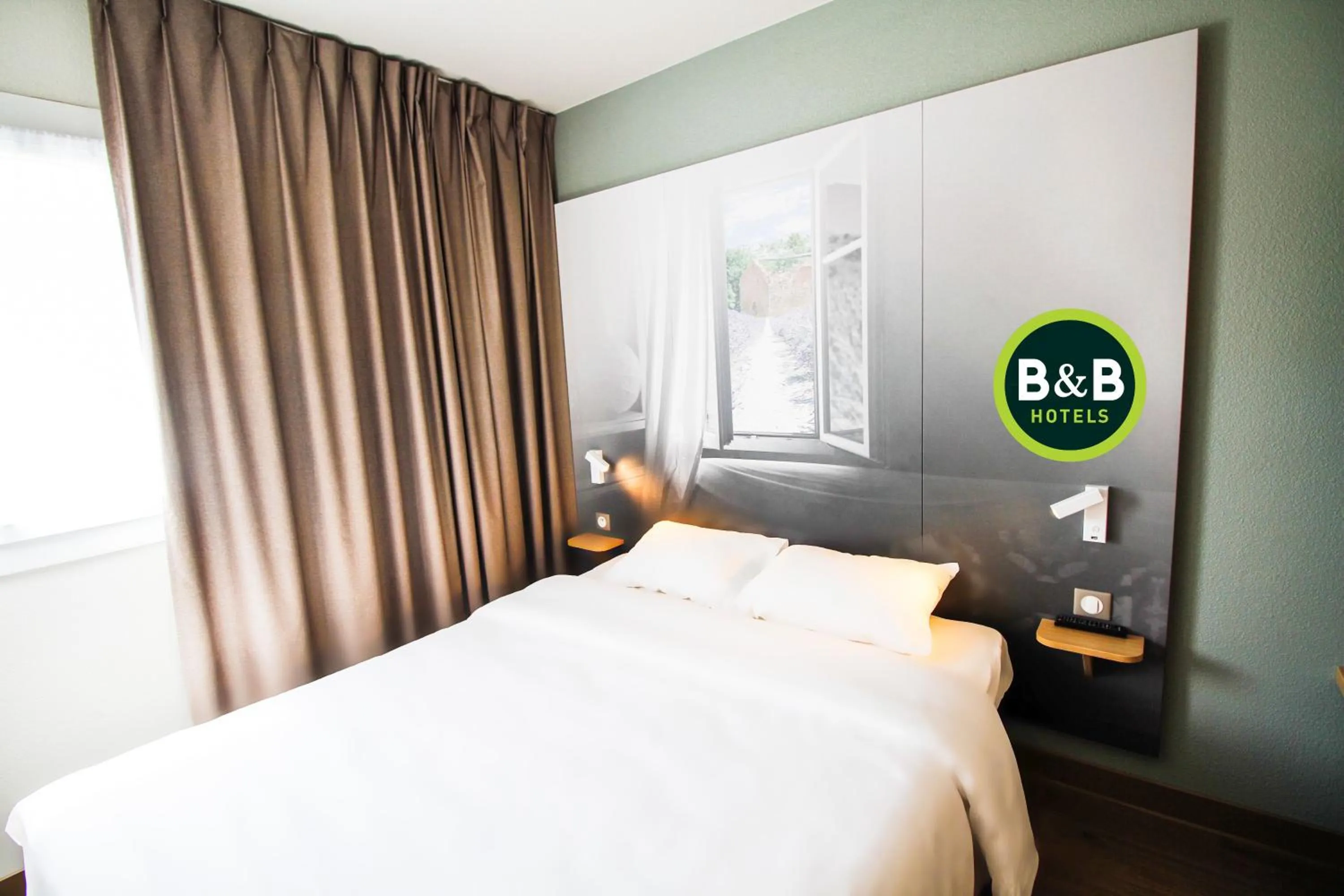 Bed in B&B HOTEL Valence TGV Romans