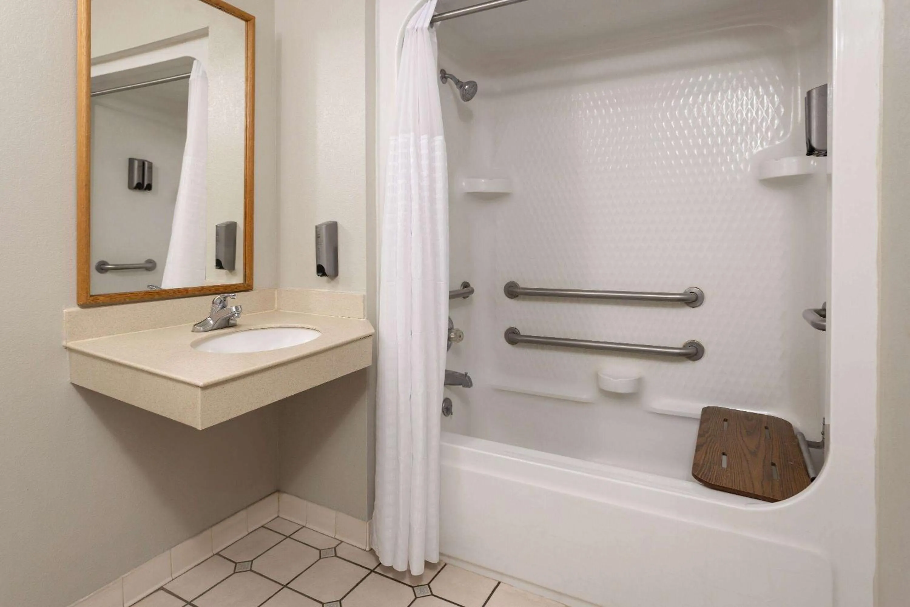 Bathroom in Days Inn & Suites by Wyndham Albany