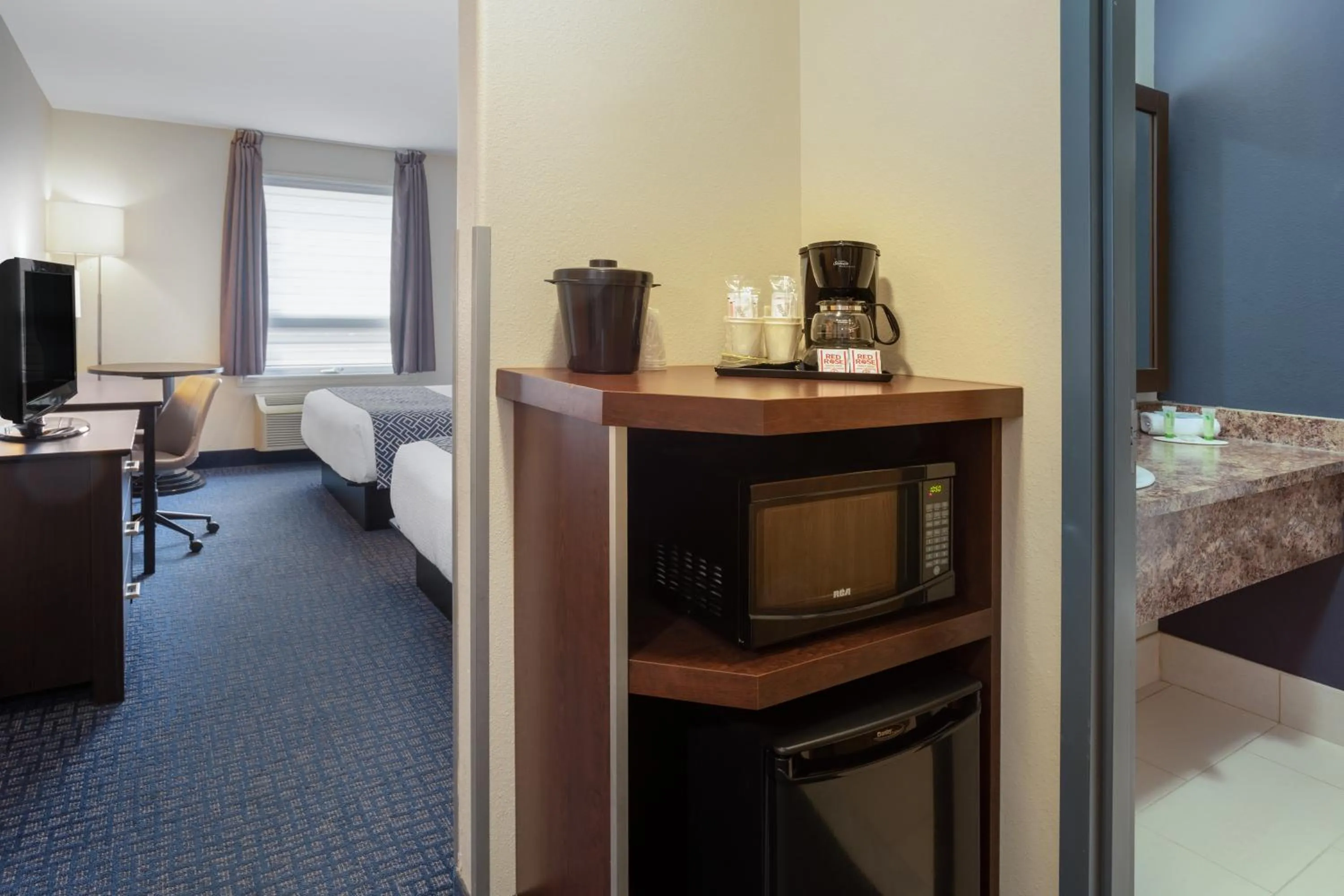 Bed in Super 8 by Wyndham Lachenaie/Terrebonne