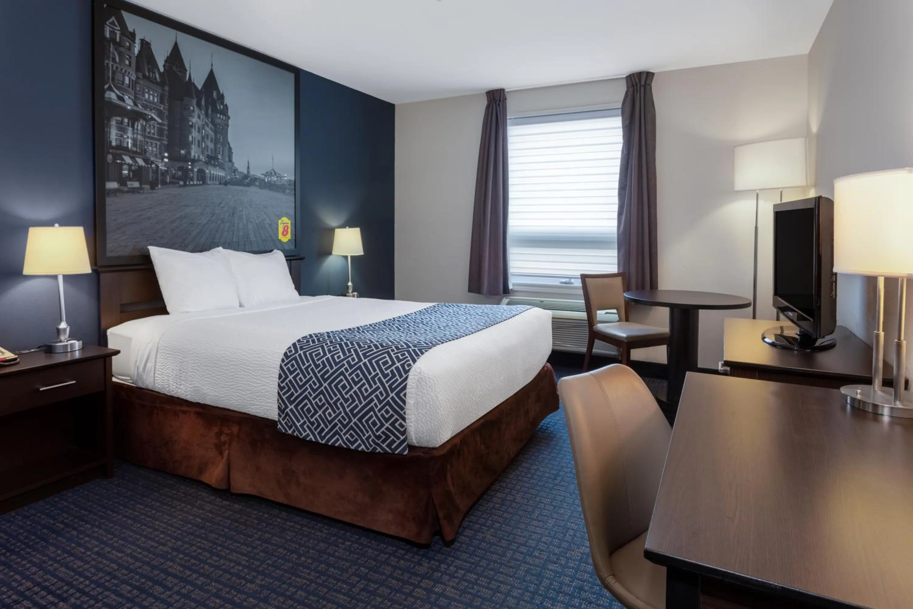 Bed in Super 8 by Wyndham Lachenaie/Terrebonne