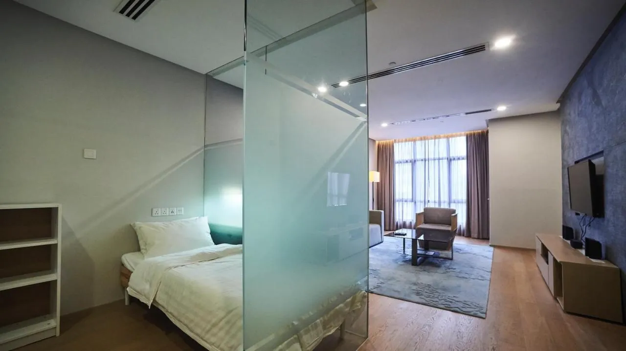 Bed in 188 Suites by NamaStay