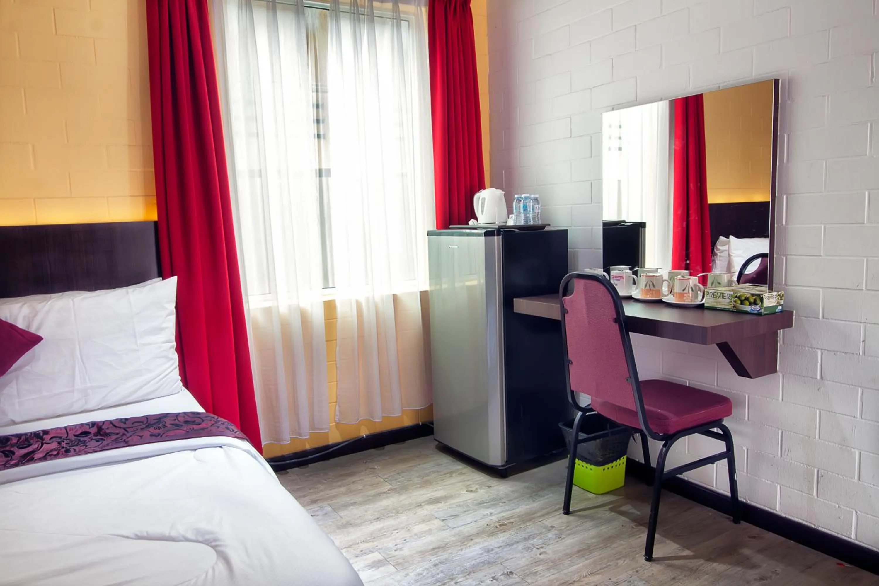 Bed in Myvilla Langkawi Hotel