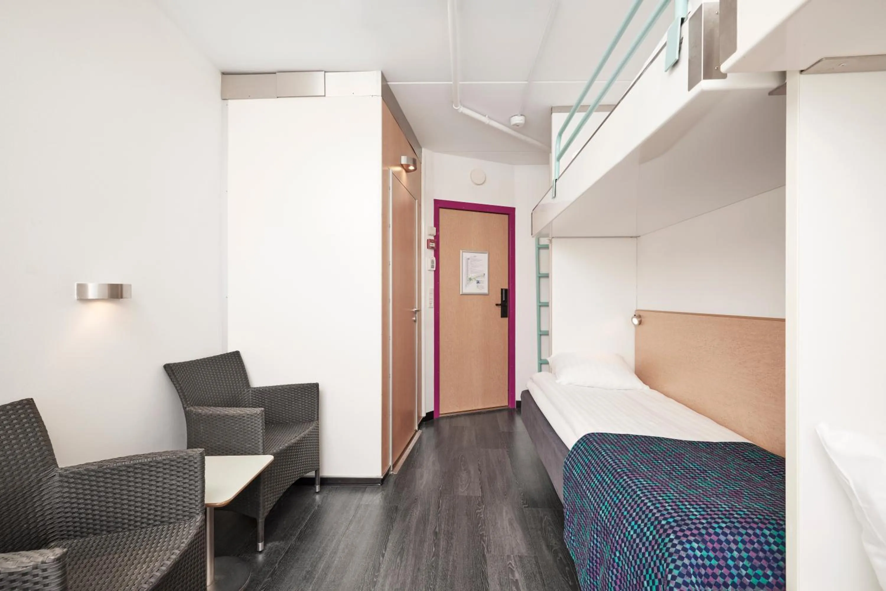 Seating area, Bed in Cabinn Metro