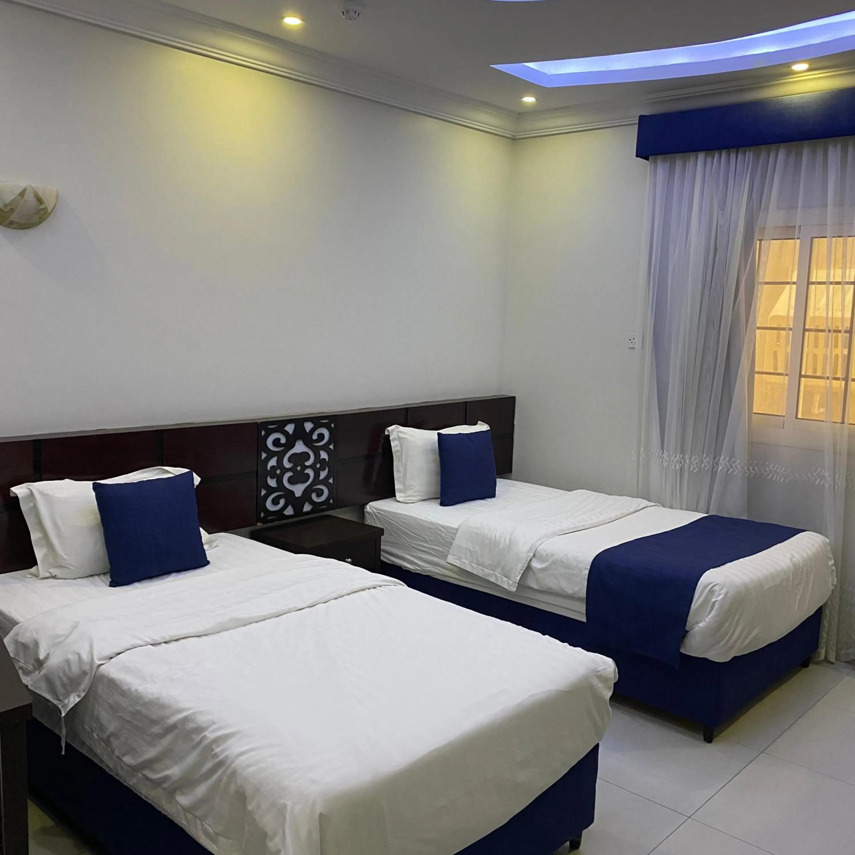 Bed in City Center Plaza Aparthotel