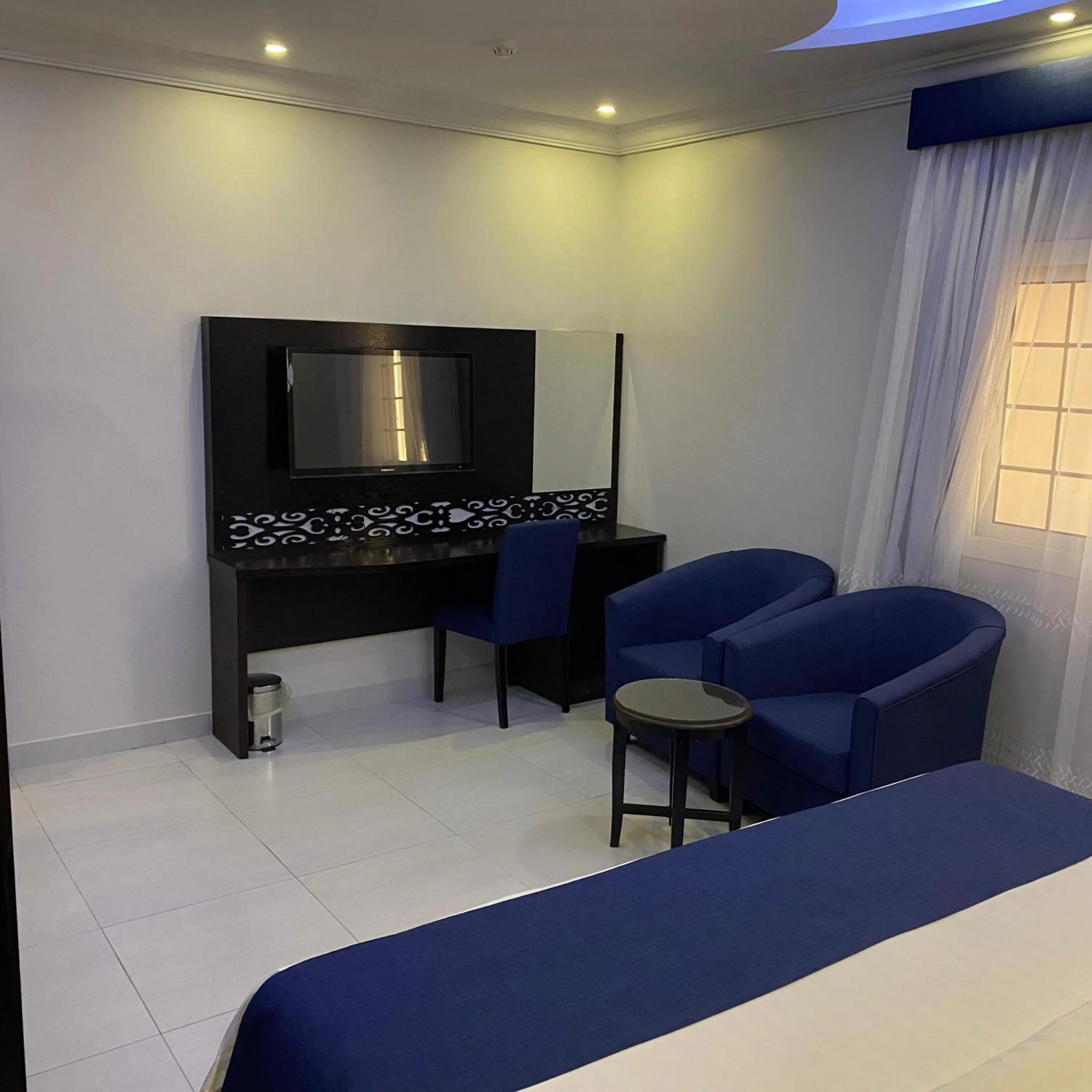 Bed in City Center Plaza Aparthotel