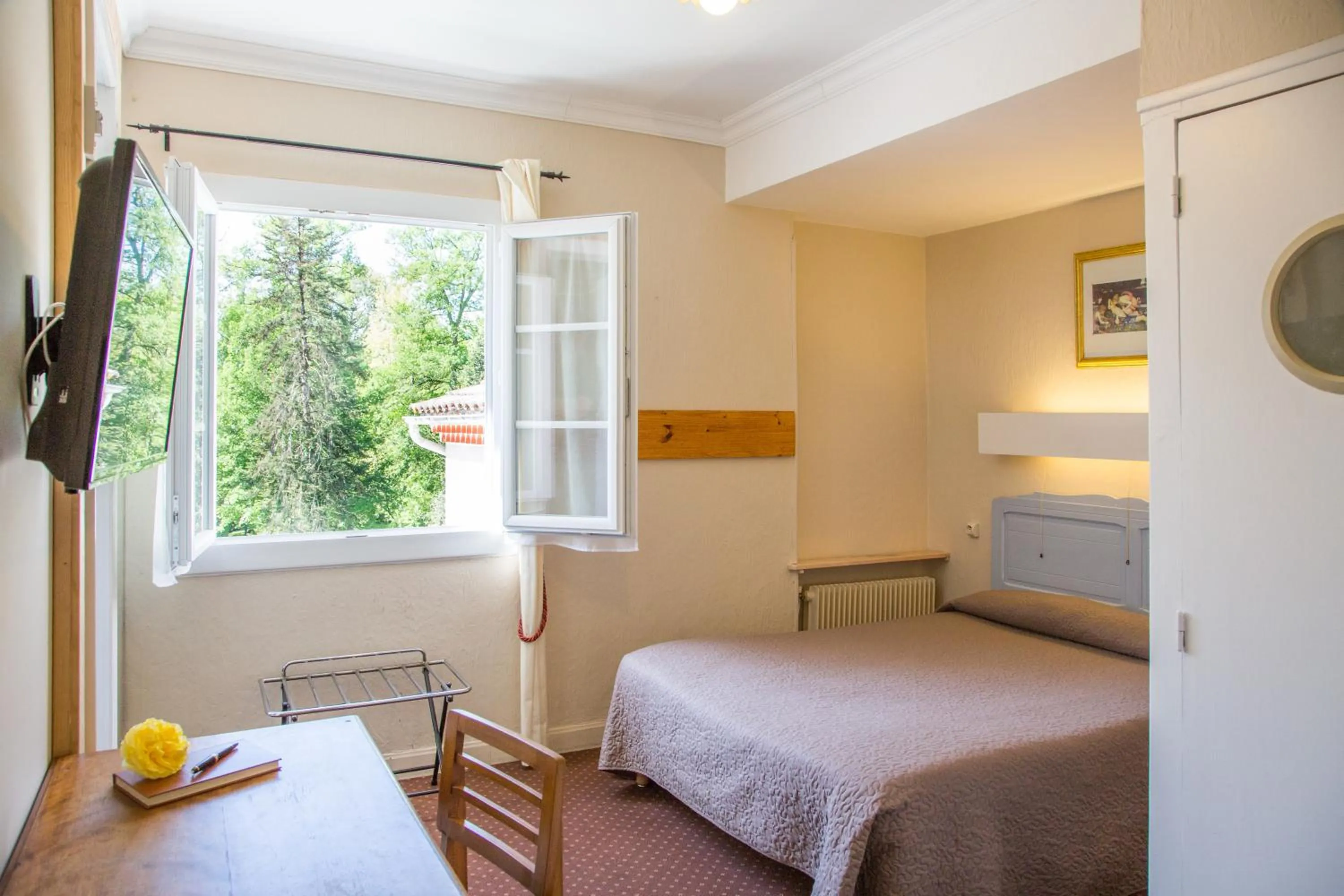 Garden view in Hostellerie de La Roseraie