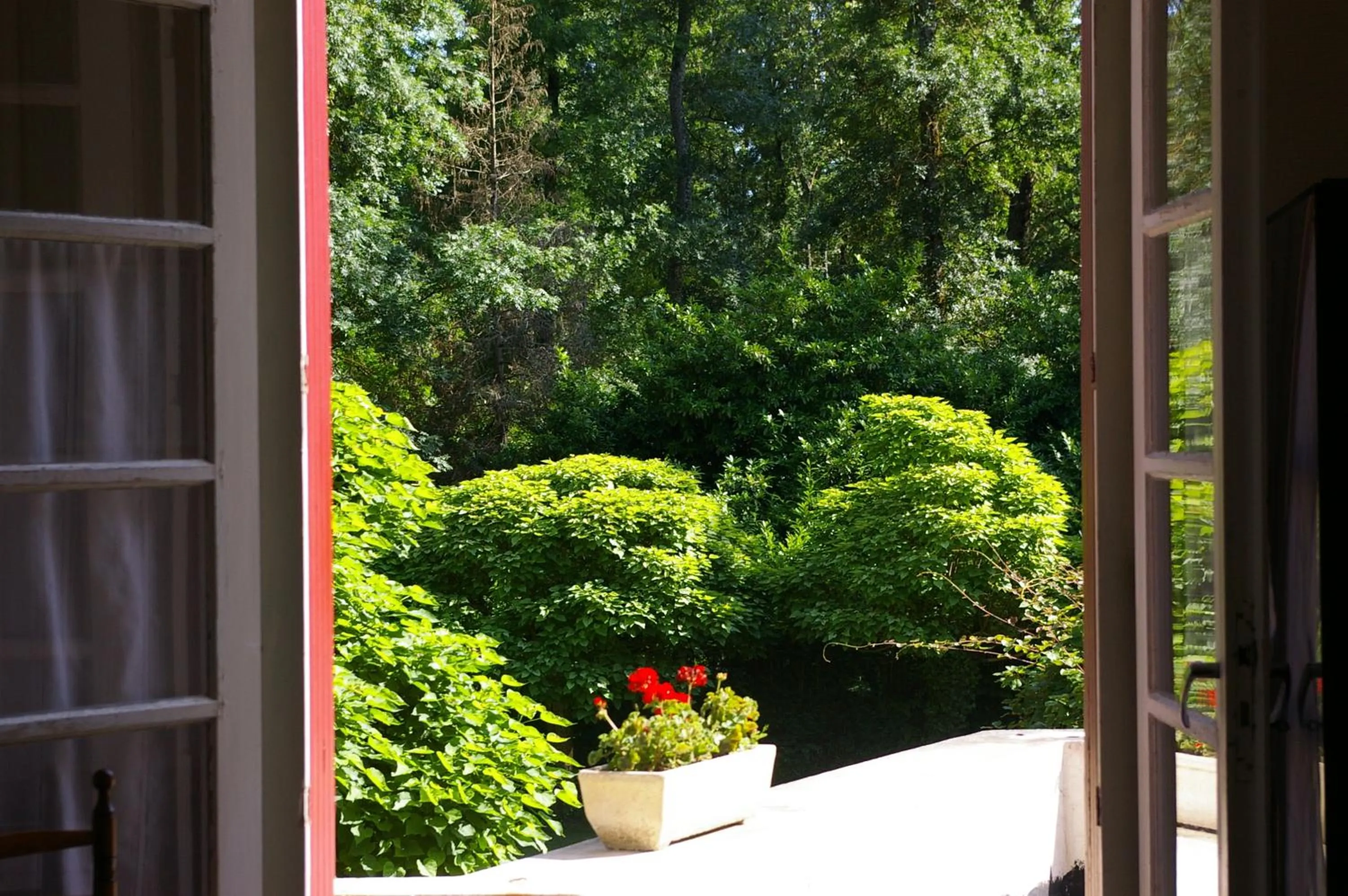 Garden view in Hostellerie de La Roseraie