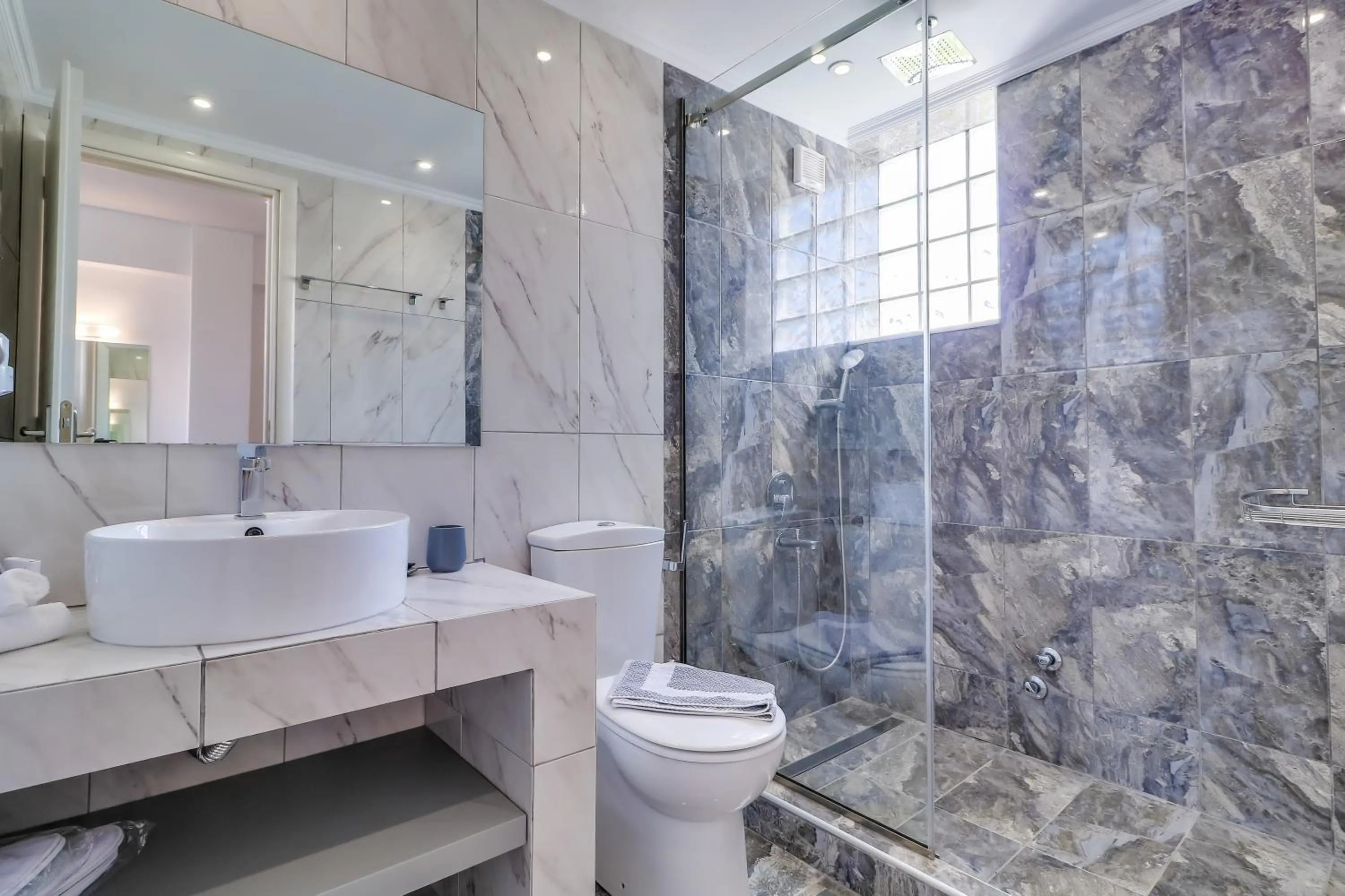 Bathroom in Theros Villas & Suites