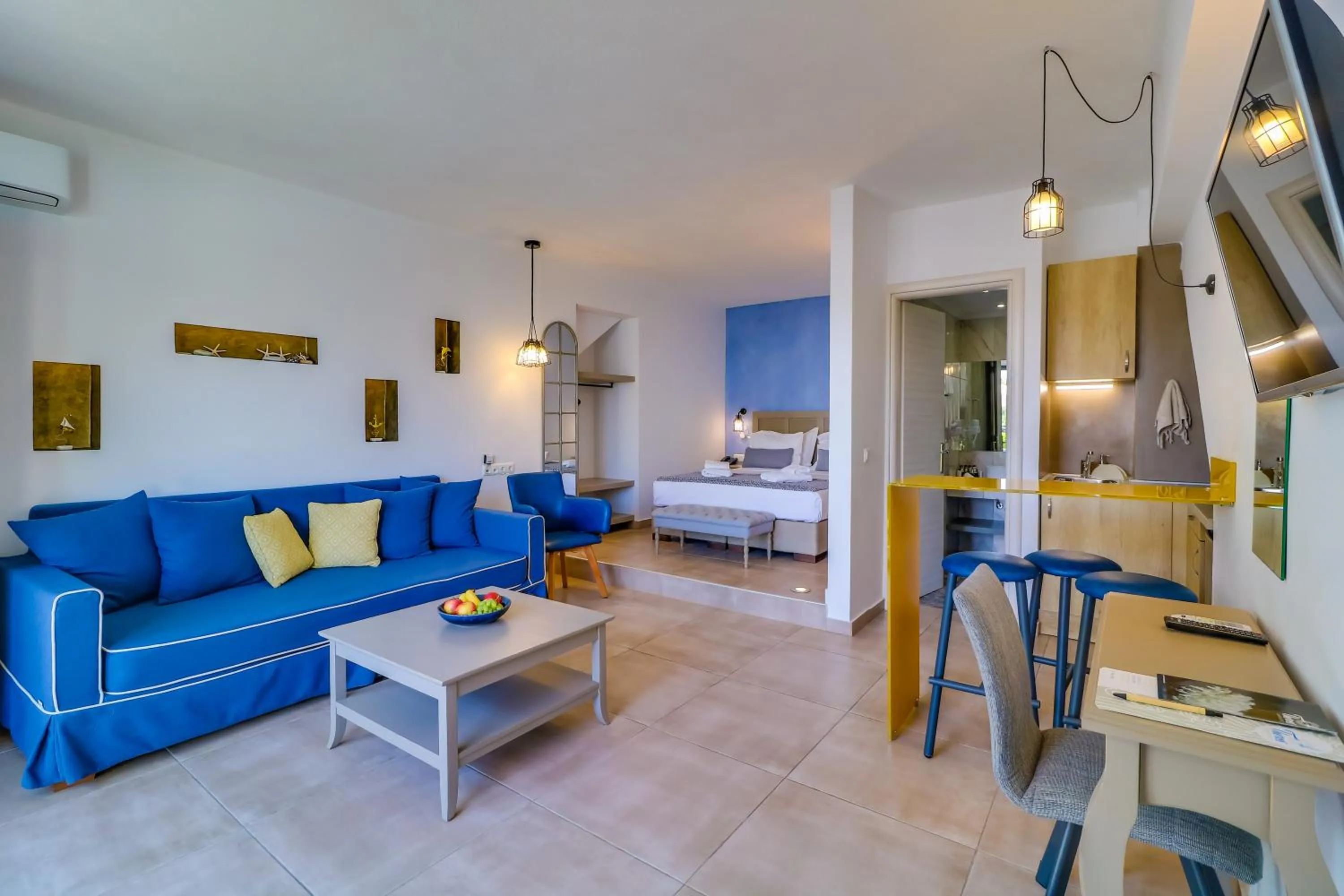 Bed in Theros Villas & Suites