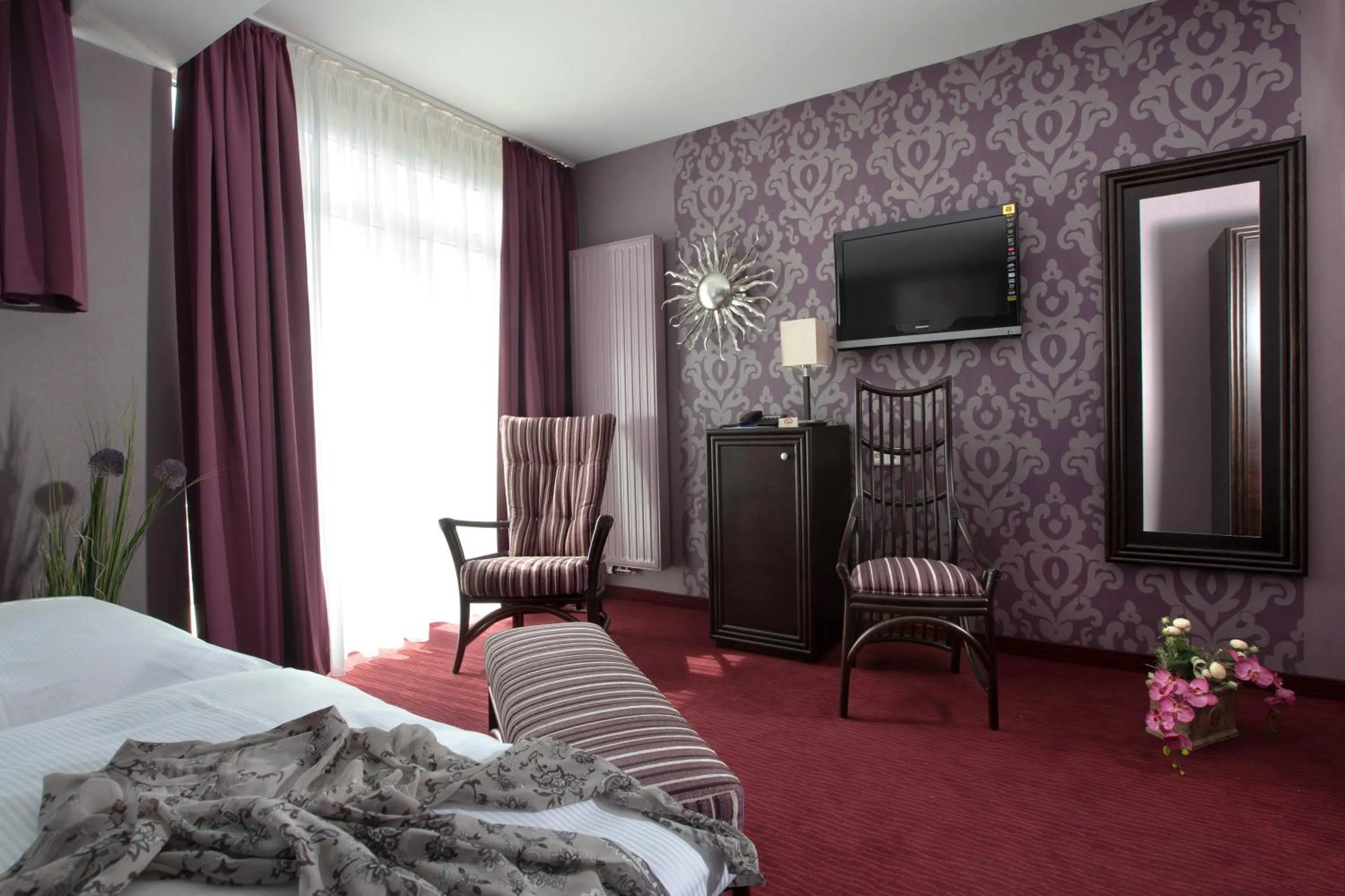 Seating area, Bed in Göbel's Hotel AquaVita