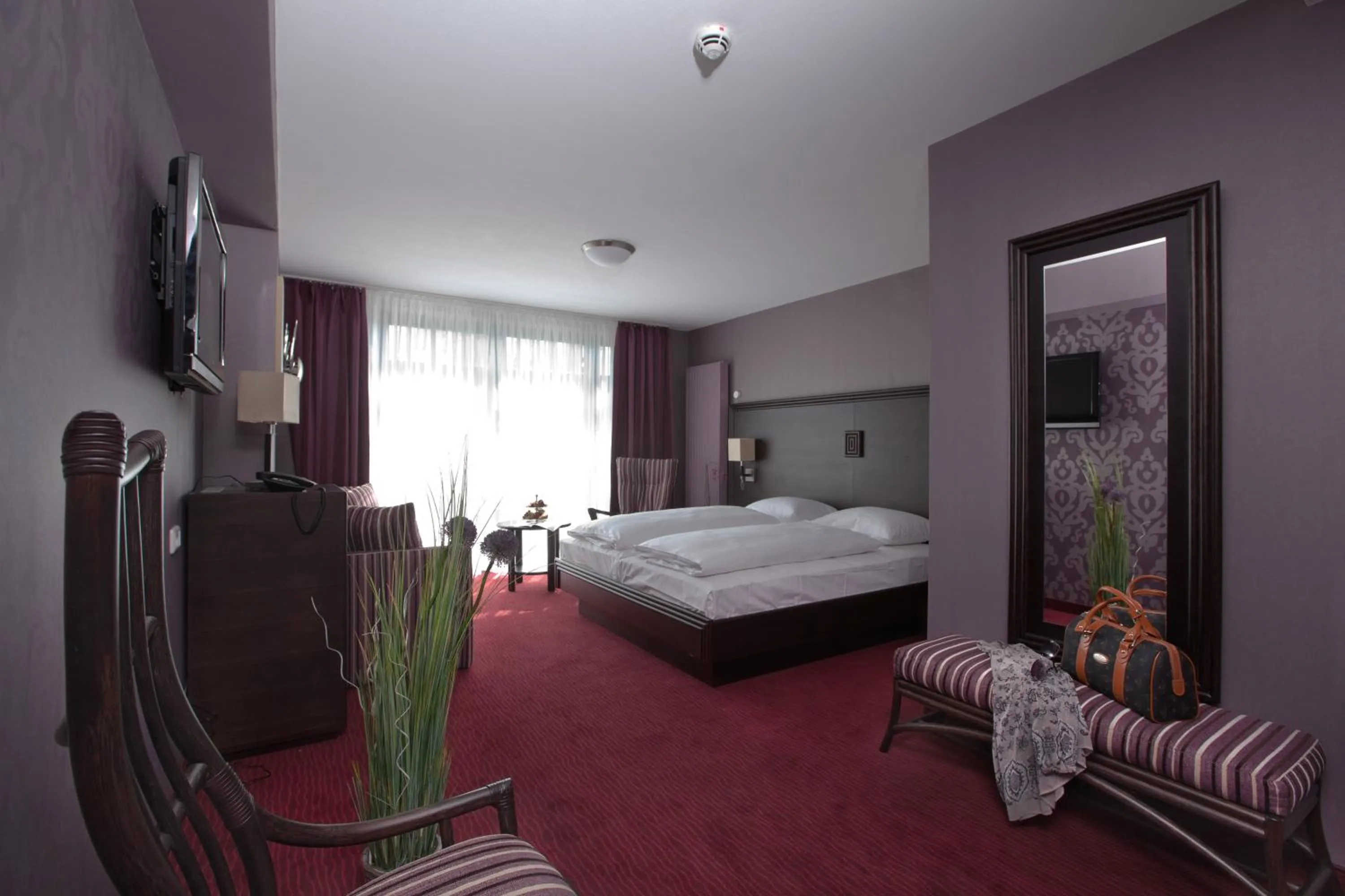 Photo of the whole room, Bed in Göbel's Hotel AquaVita