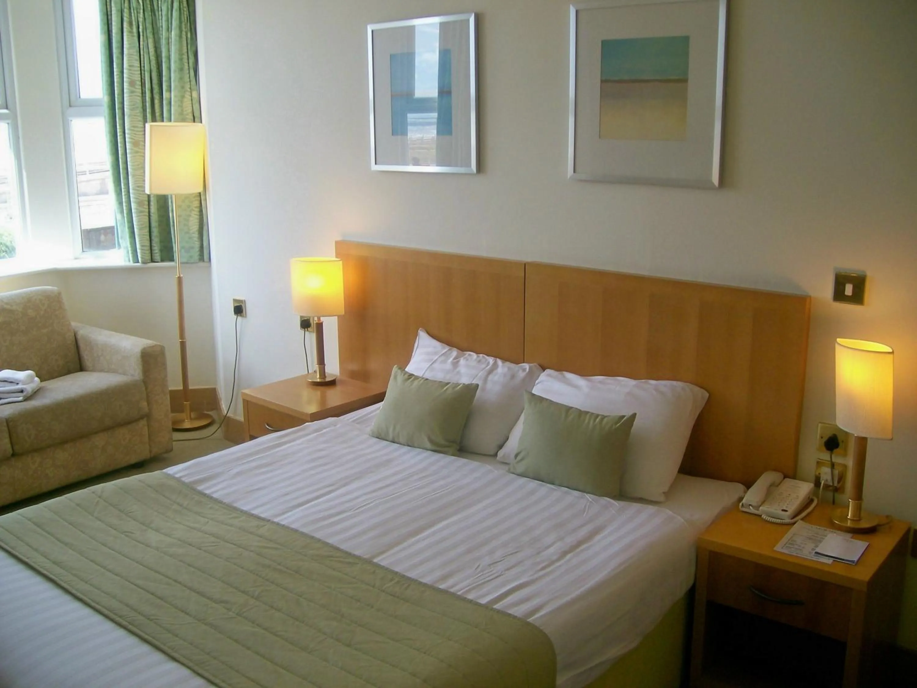 Bed in Carousel Hotel