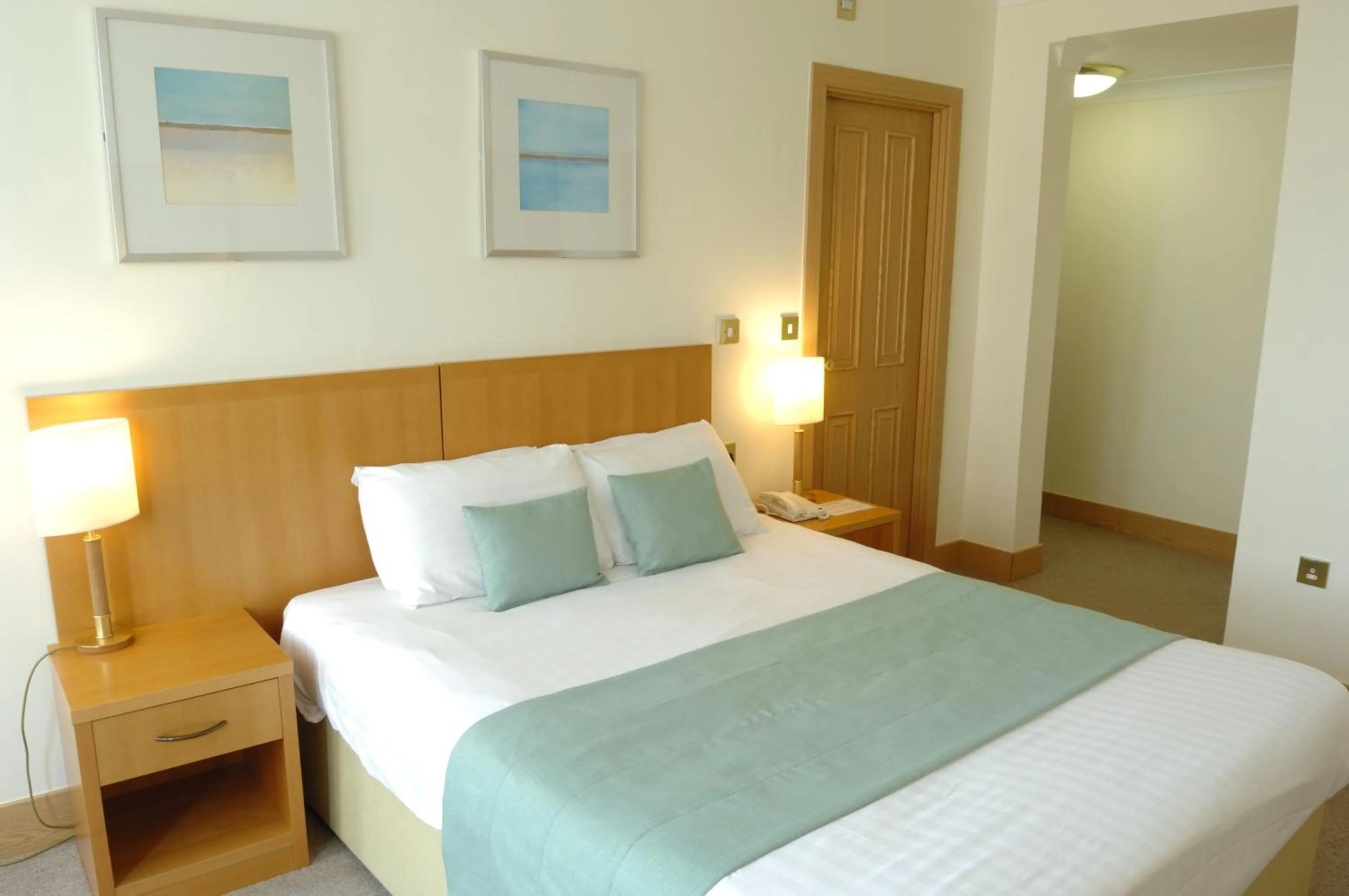 Bed in Carousel Hotel