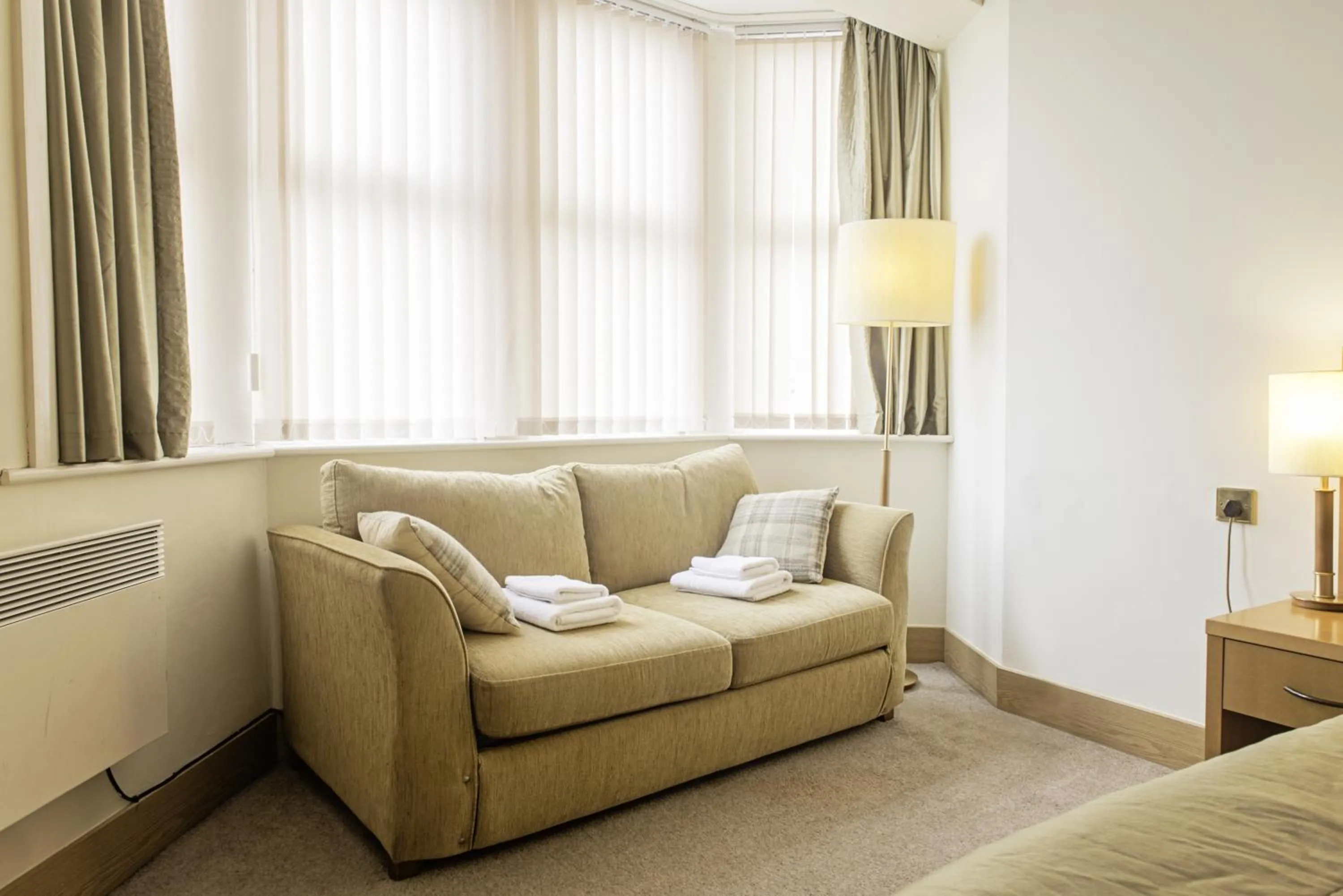 Bed in Carousel Hotel