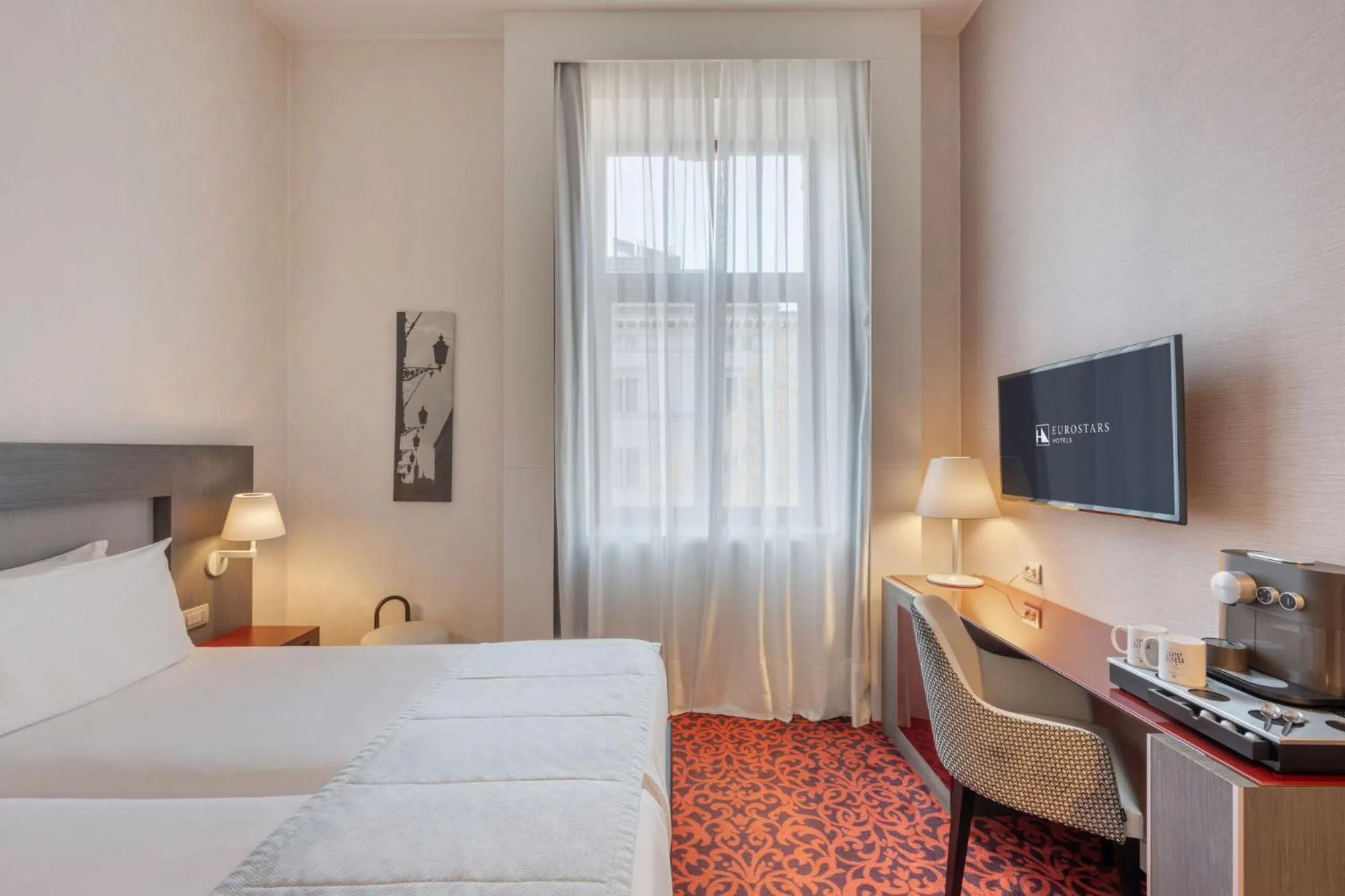 Bed in Eurostars Palazzo Zichy