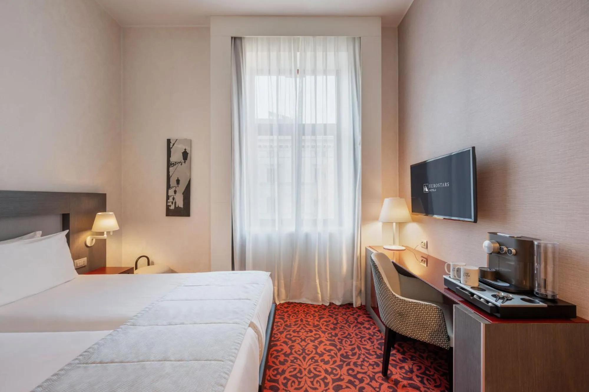 Bed in Eurostars Palazzo Zichy