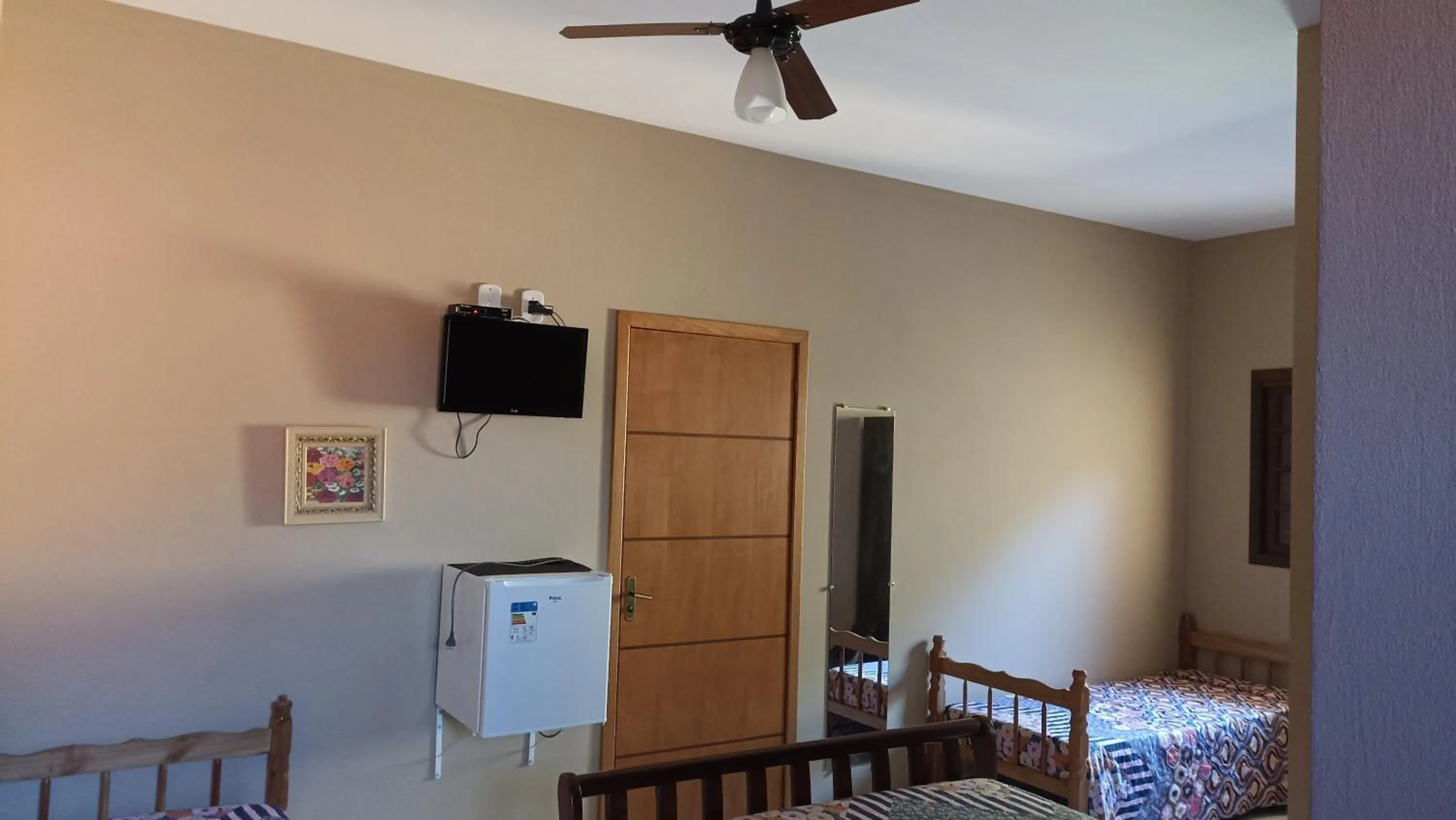 Bed in Pousada Alejandro