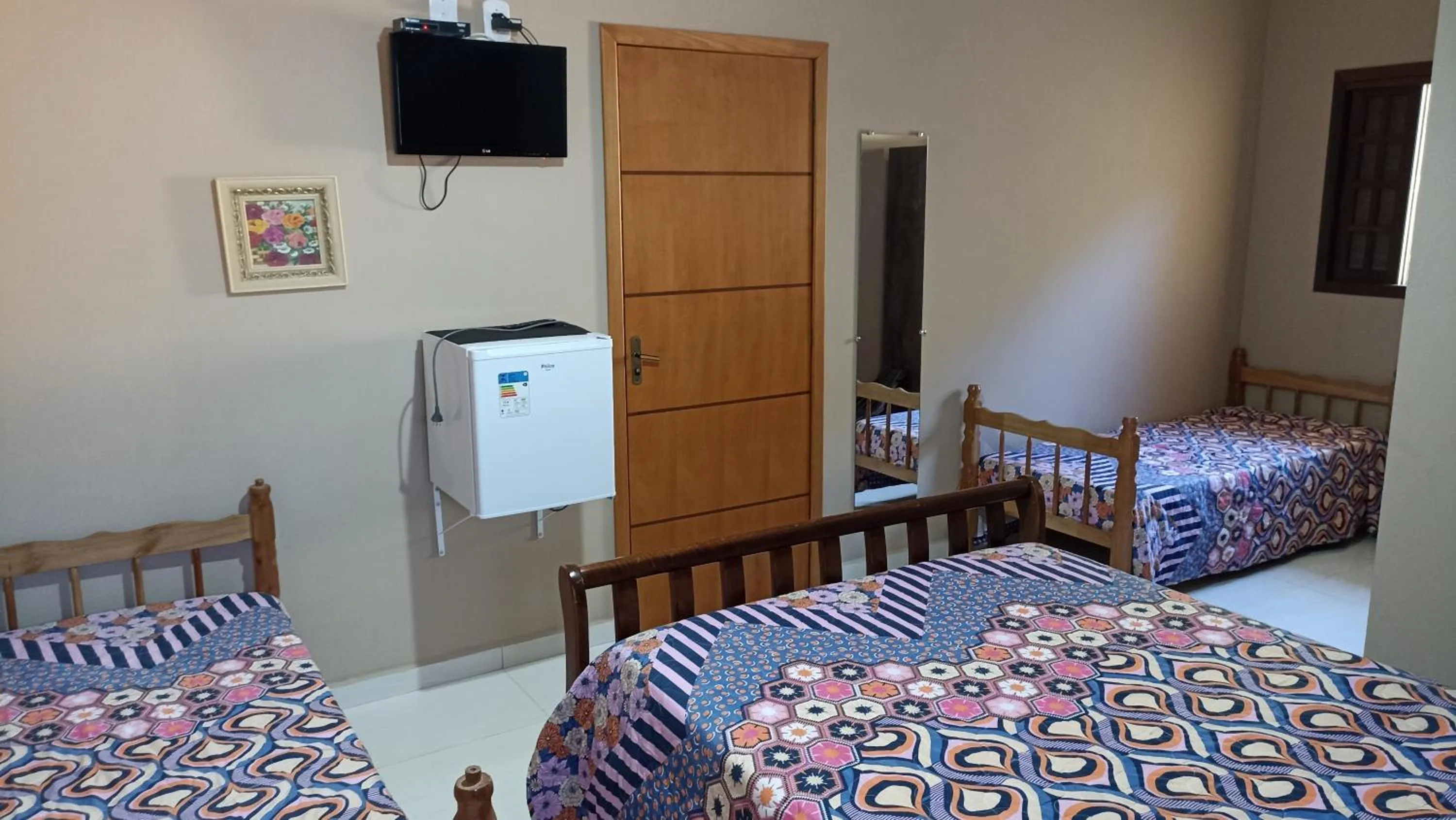 Bed in Pousada Alejandro