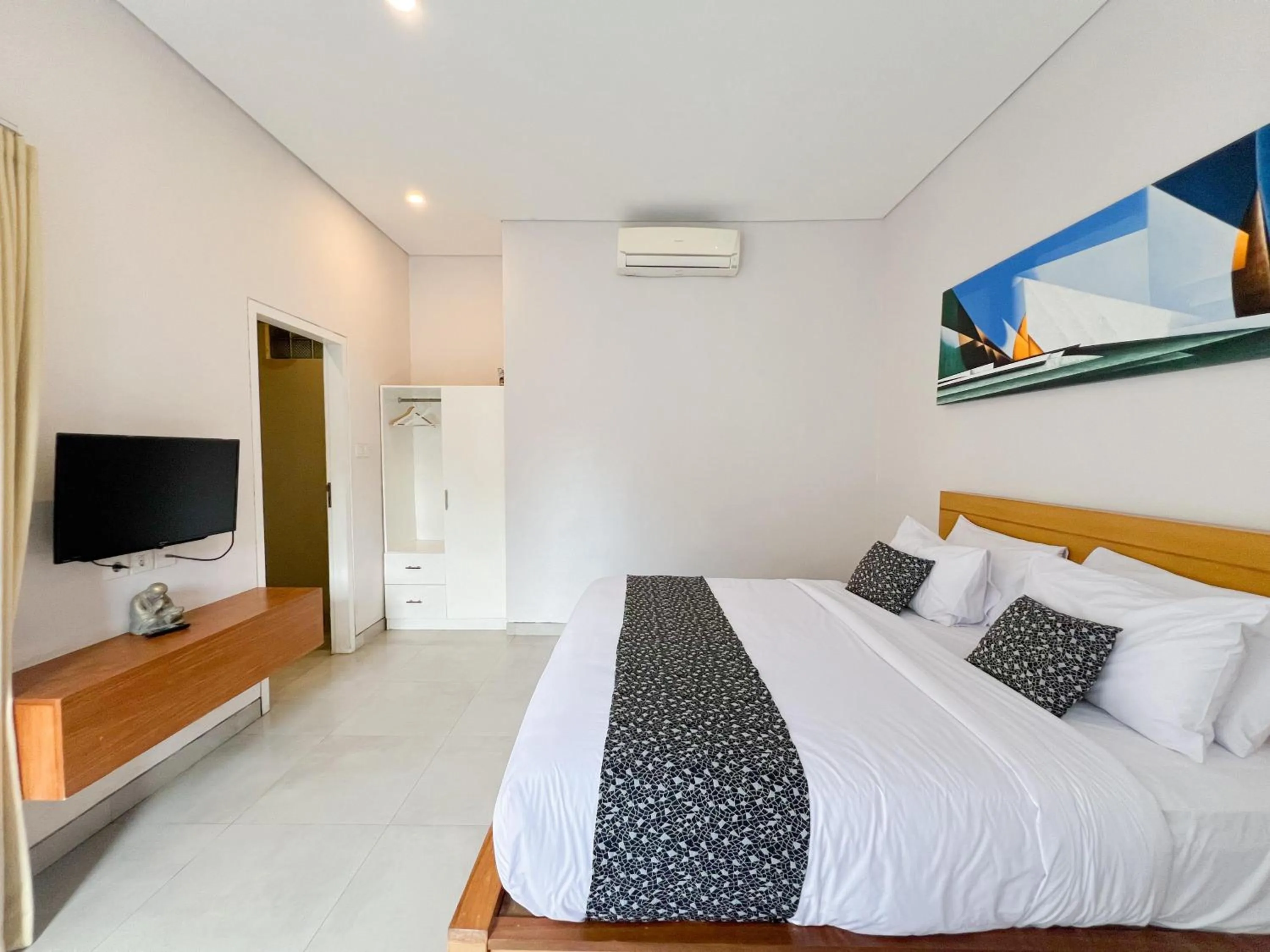 Bed in Apple Villa & Suite Seminyak