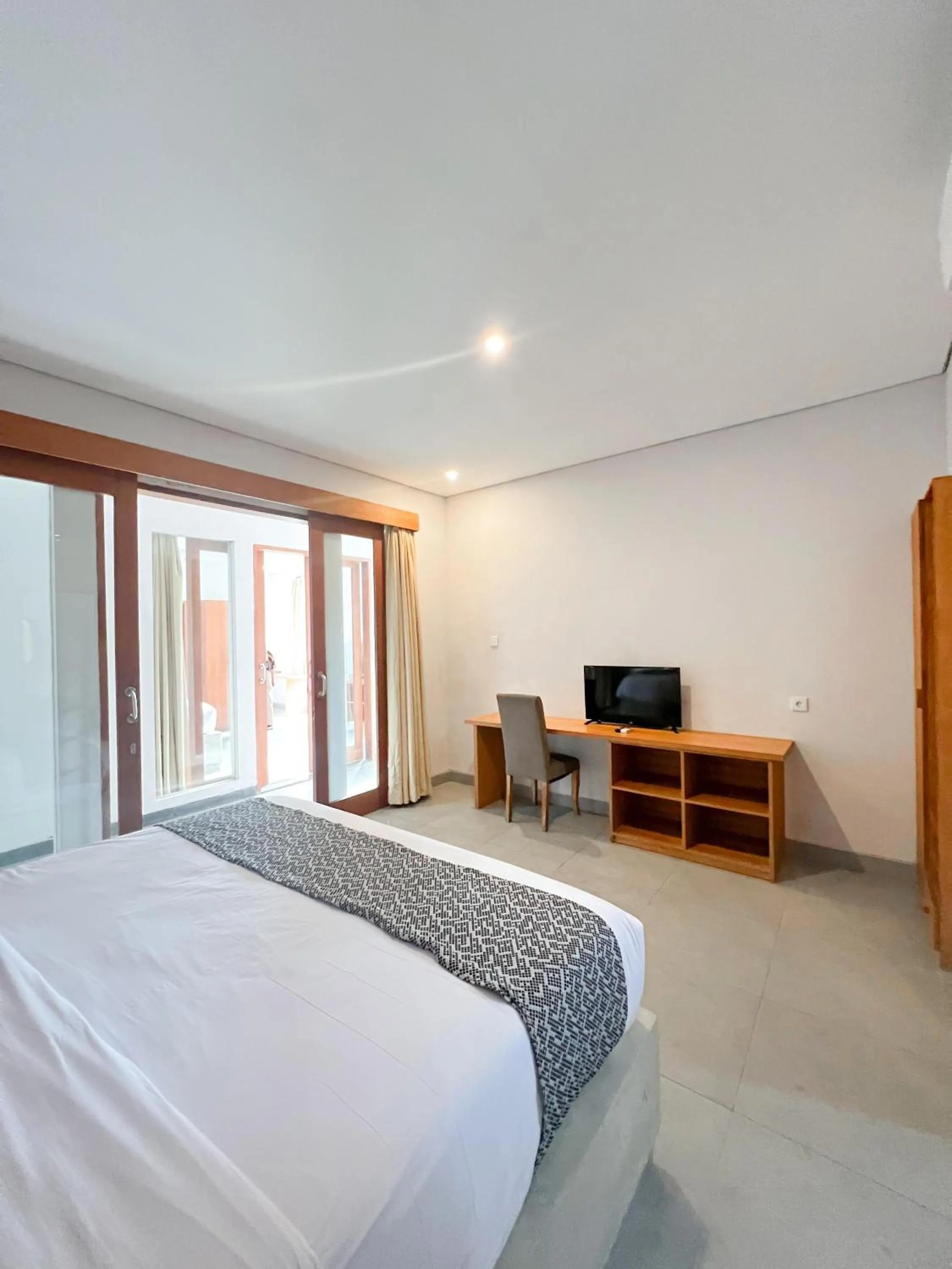 Bed in Apple Villa & Suite Seminyak
