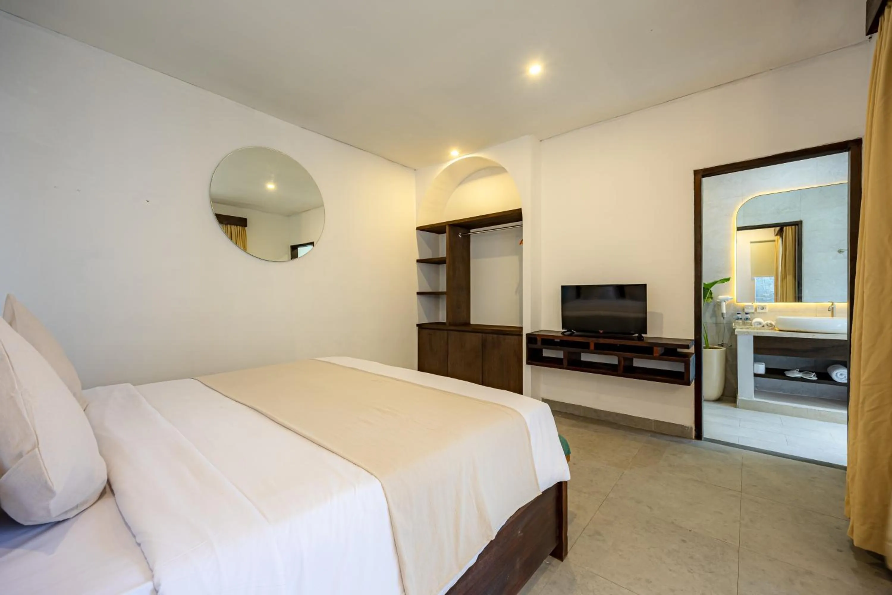 Bed in Apple Villa & Suite Seminyak