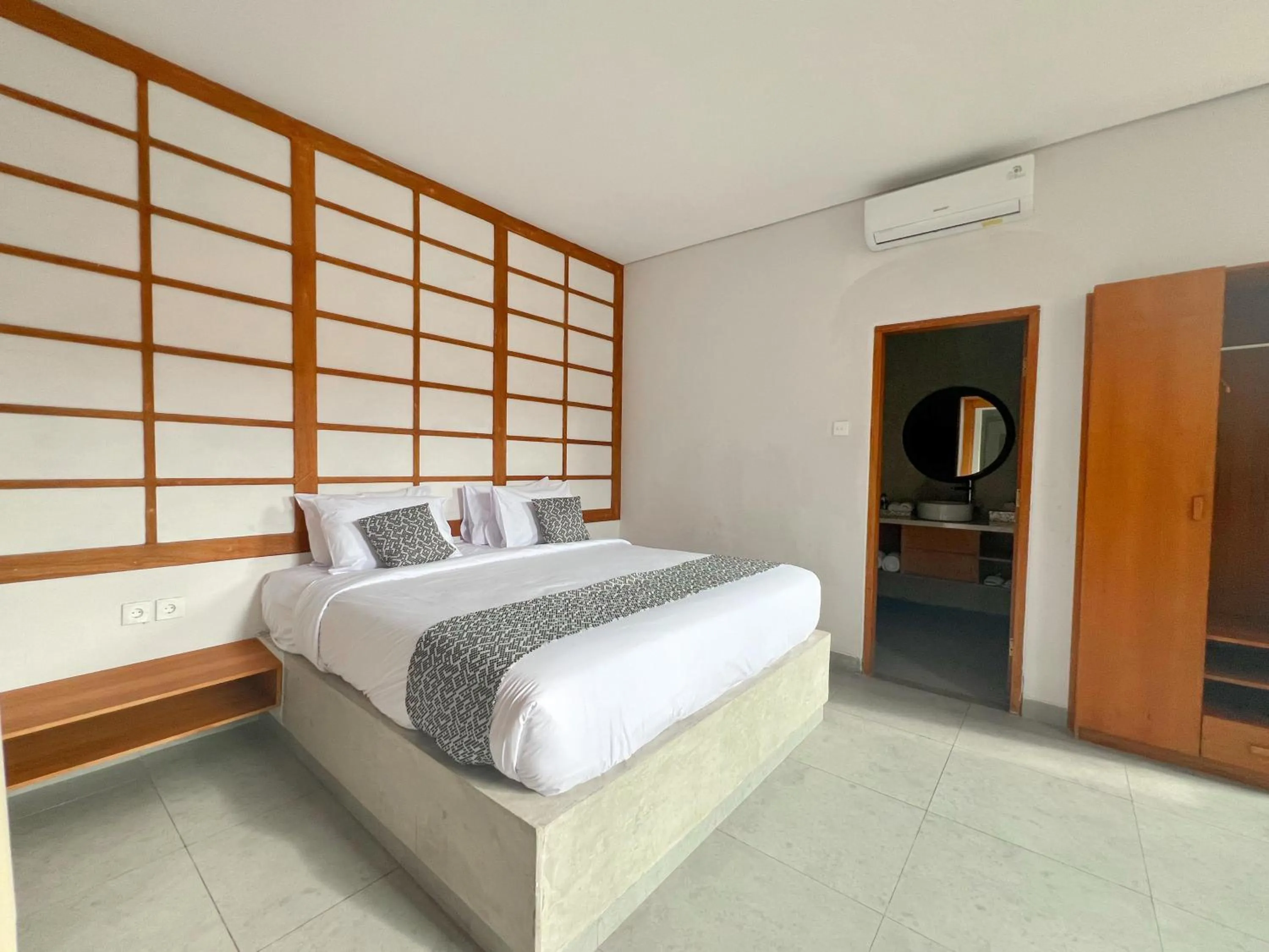 Bed in Apple Villa & Suite Seminyak