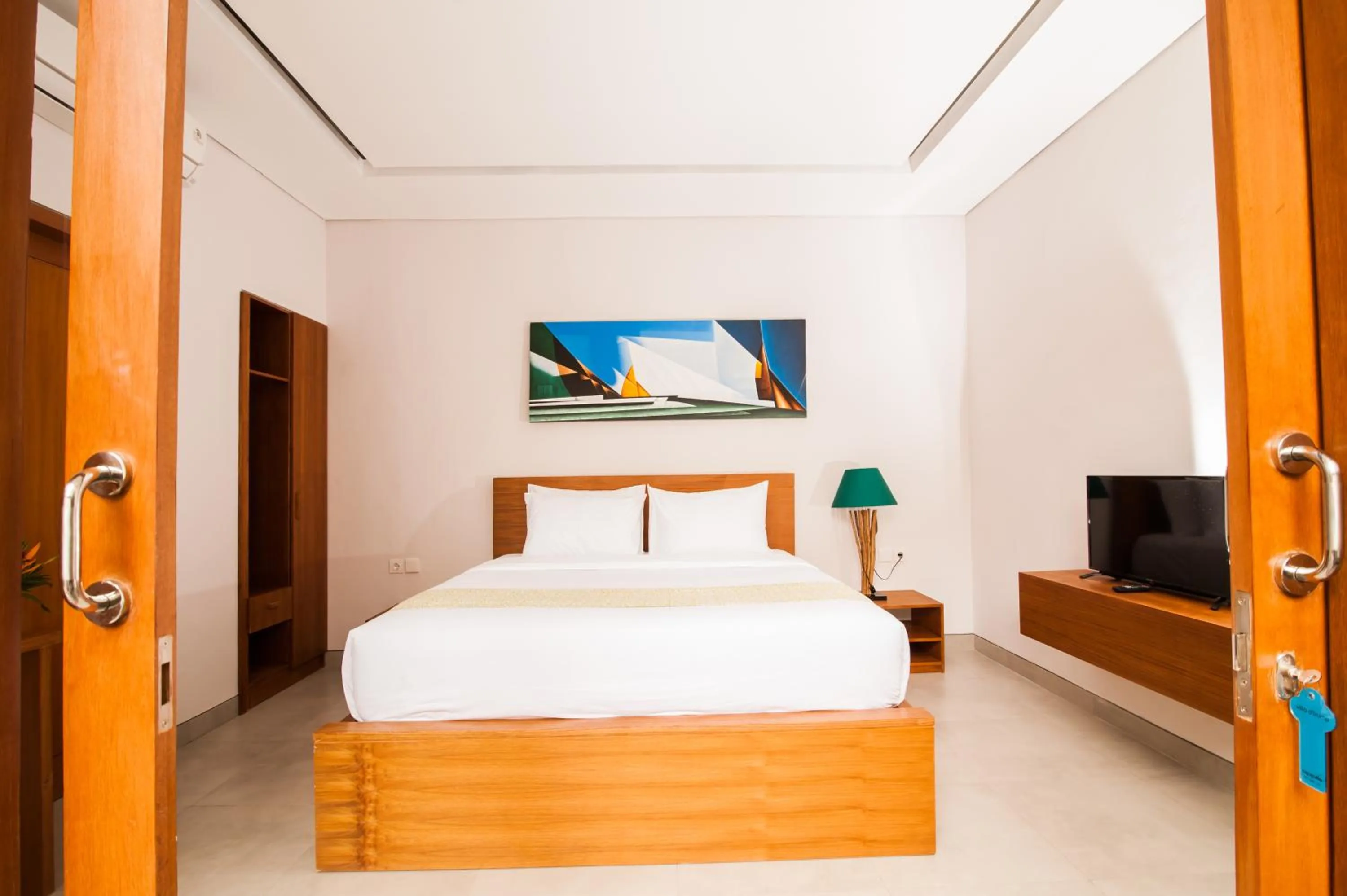 Bed in Apple Villa & Suite Seminyak