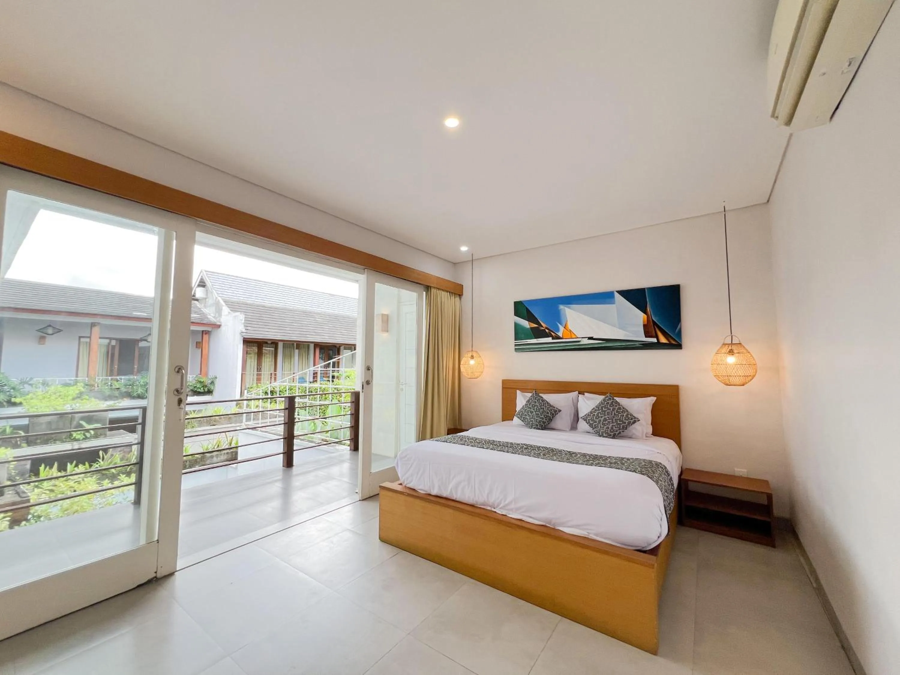 Bed in Apple Villa & Suite Seminyak