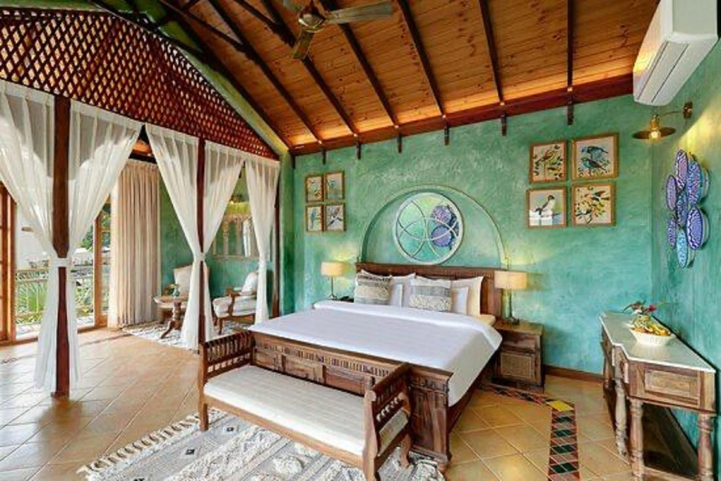 Bed in Amritara Aura Resort & Spa