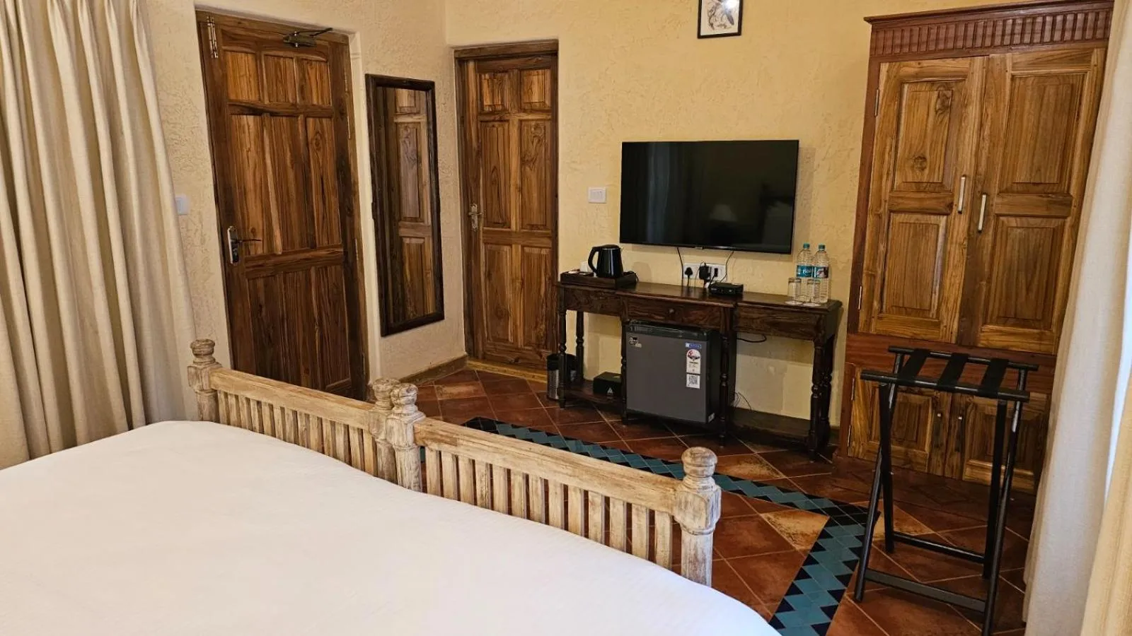 Bed in Amritara Aura Resort & Spa