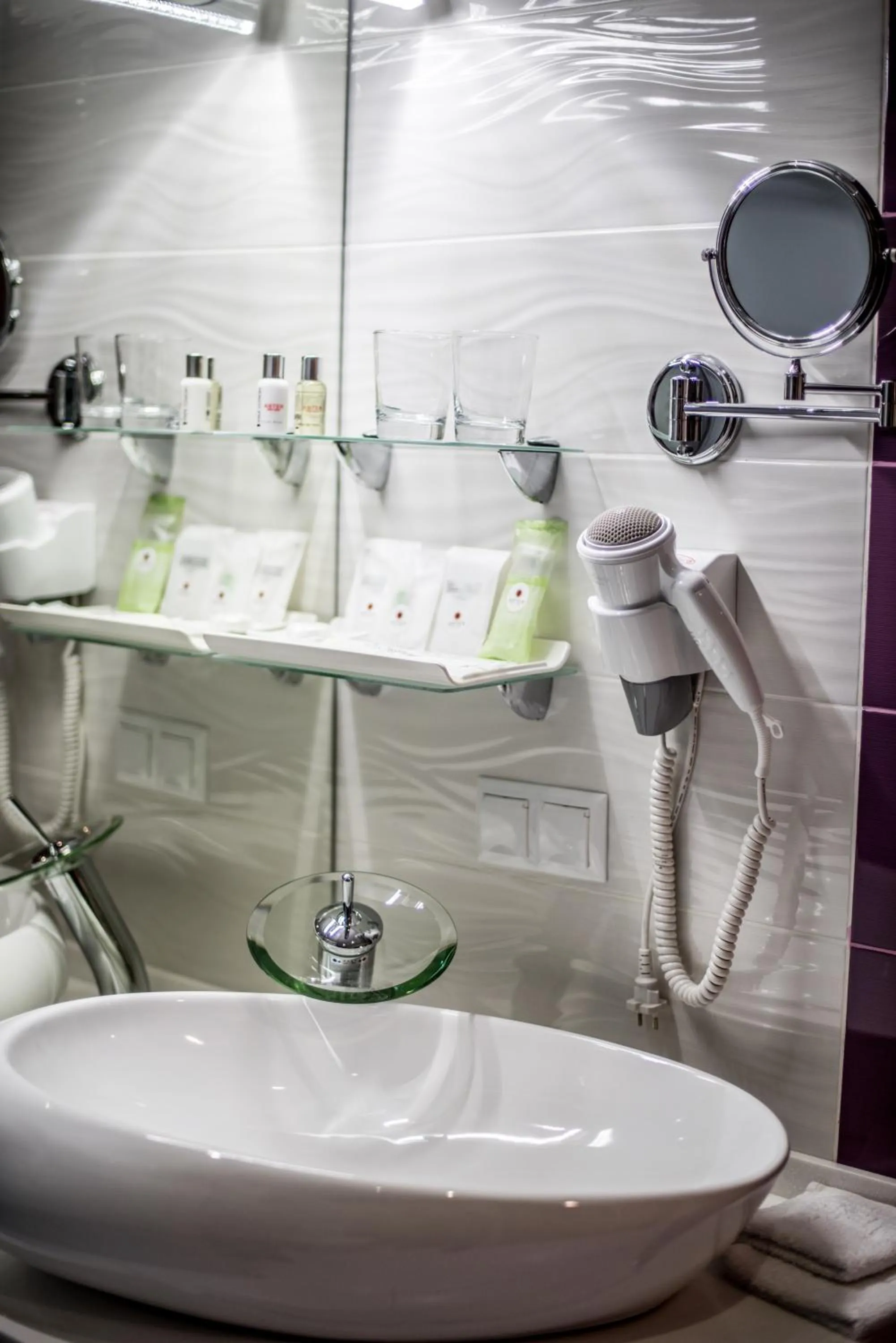 Shower in Aster Hotel Group