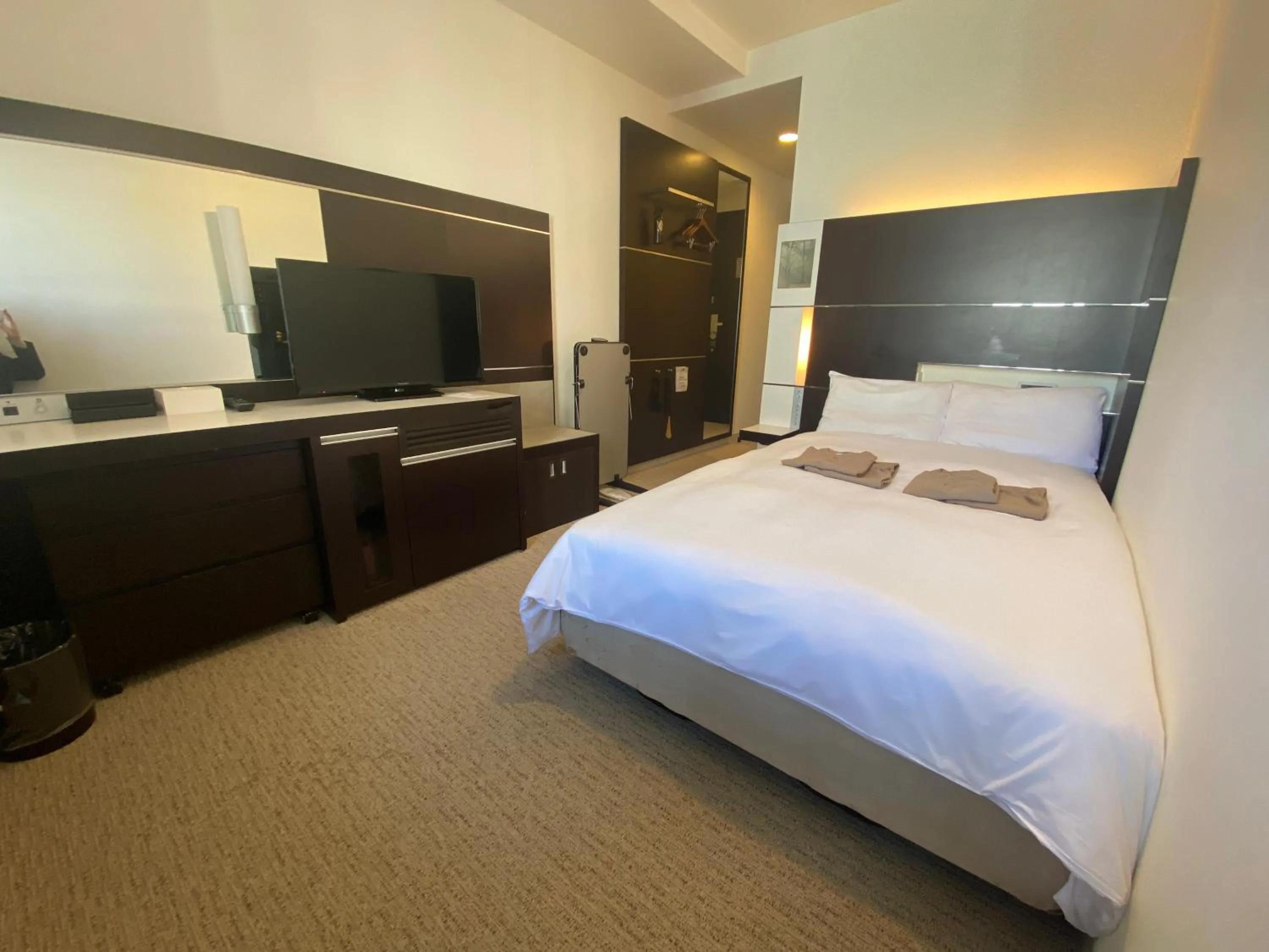 Photo of the whole room, Bed in Cross Wave Umeda