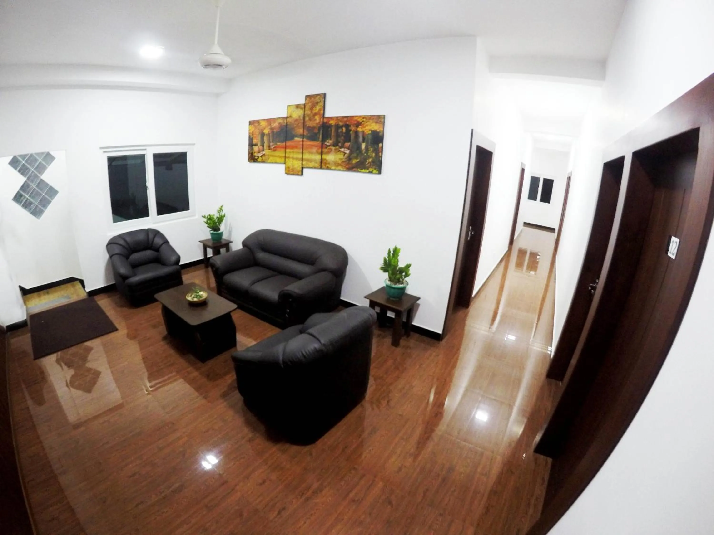 Communal lounge/ TV room in Colombo Residency