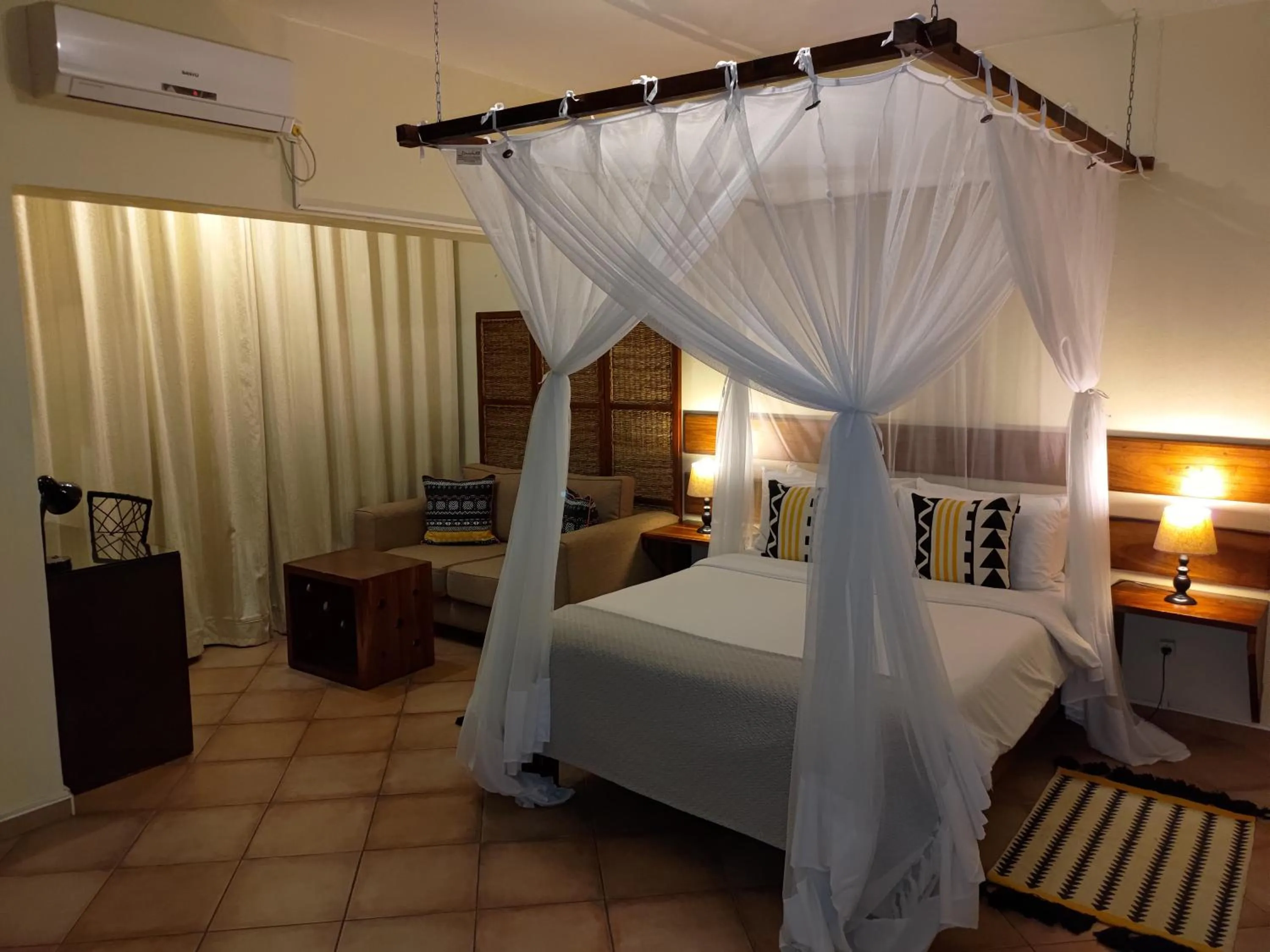 Bed in Sundown Guest House Maputo