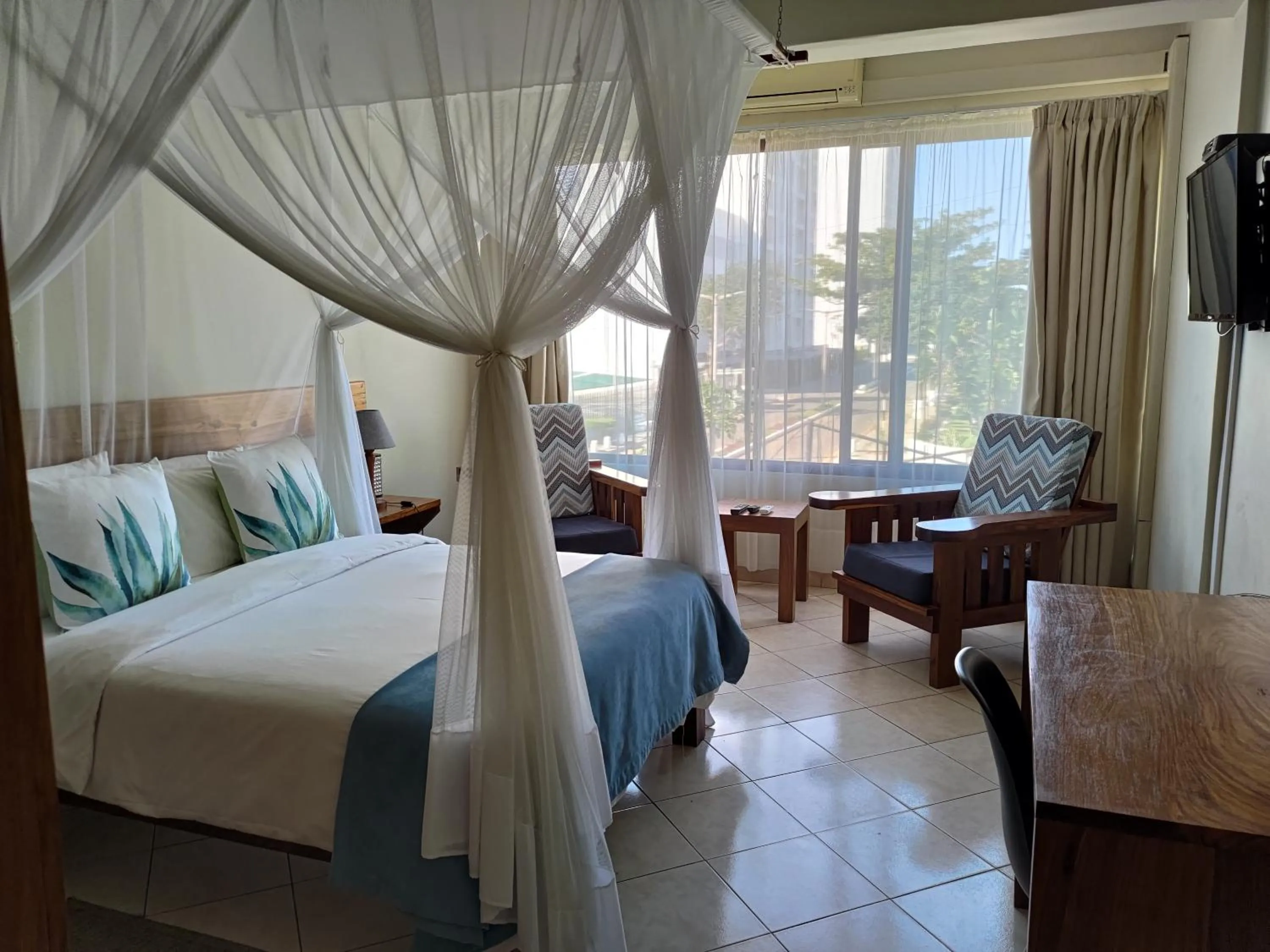 Bed in Sundown Guest House Maputo