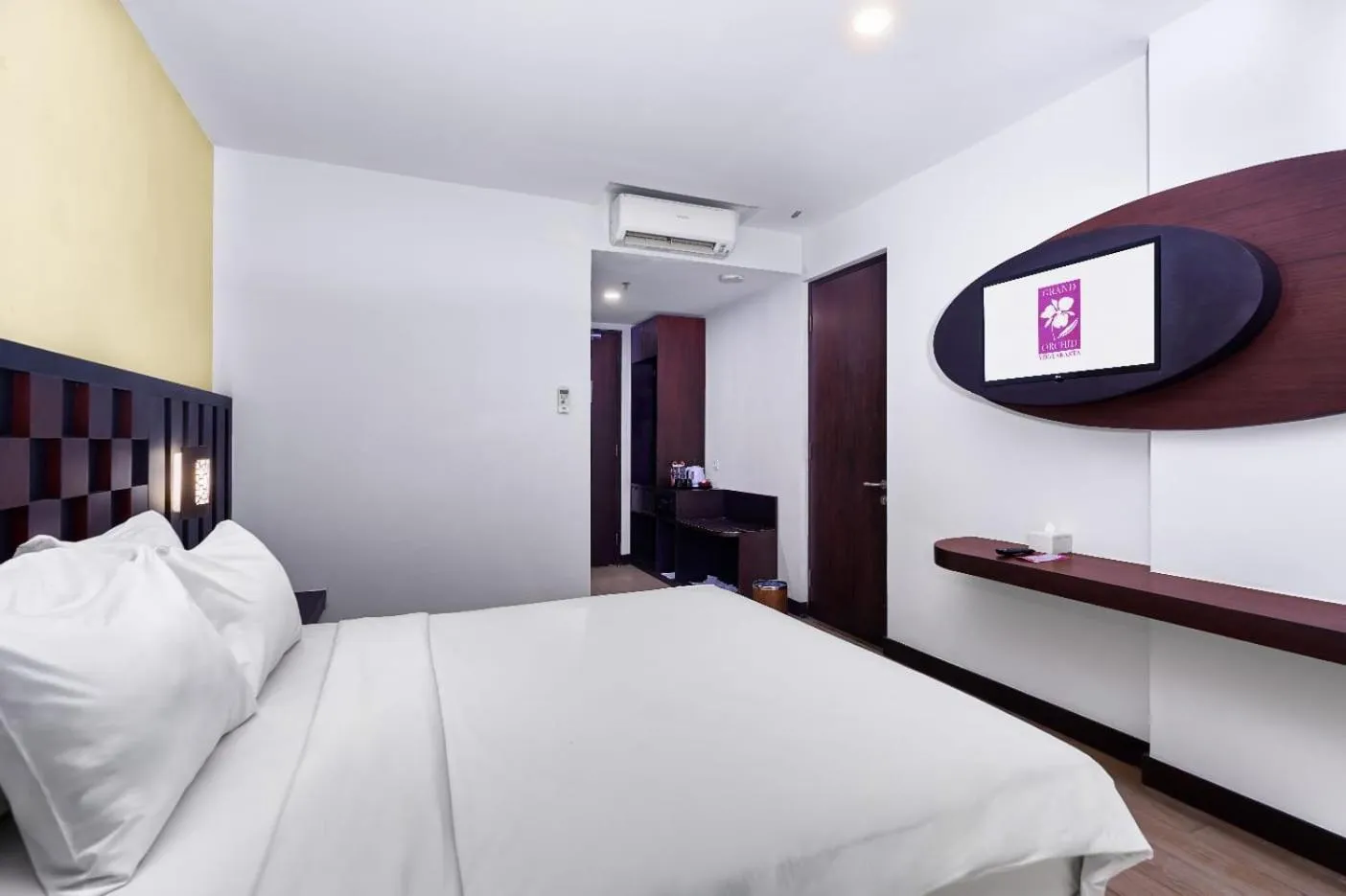 Bed in Grand Orchid Hotel Yogyakarta