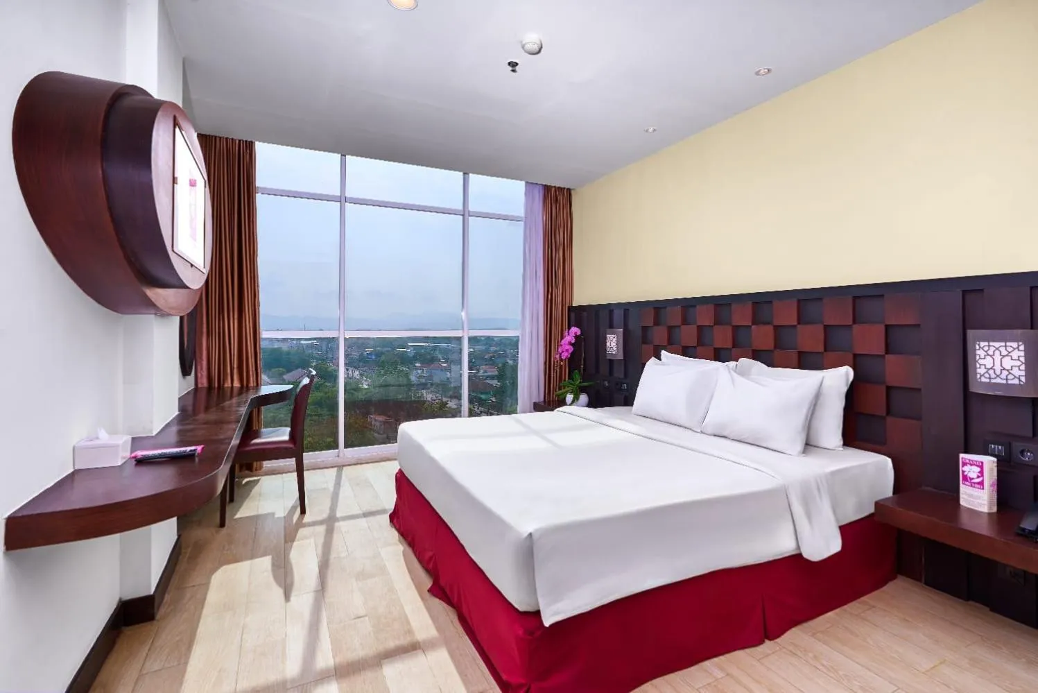 Bed in Grand Orchid Hotel Yogyakarta