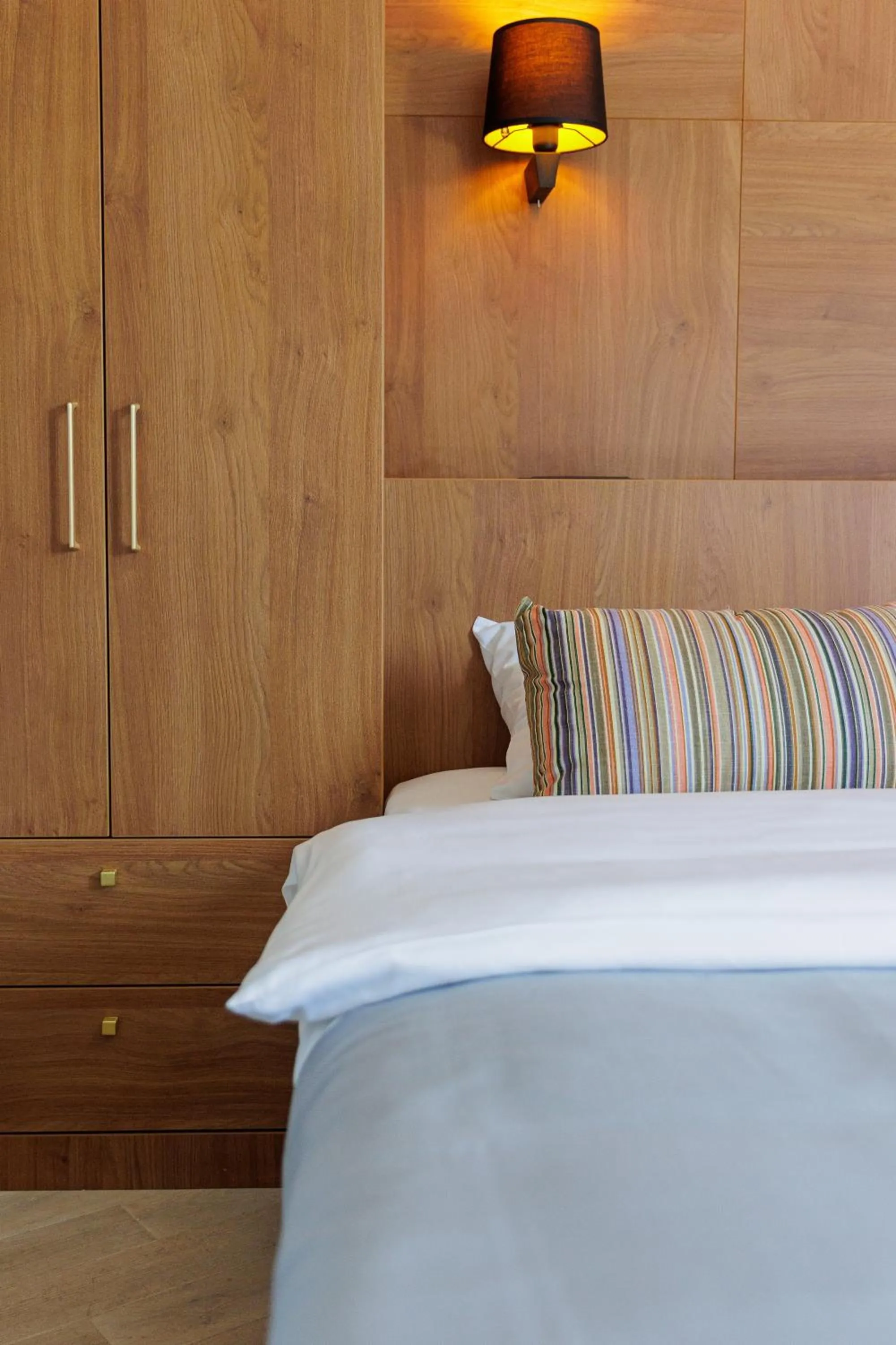 Bed in Hotel Kadmo by Aycon