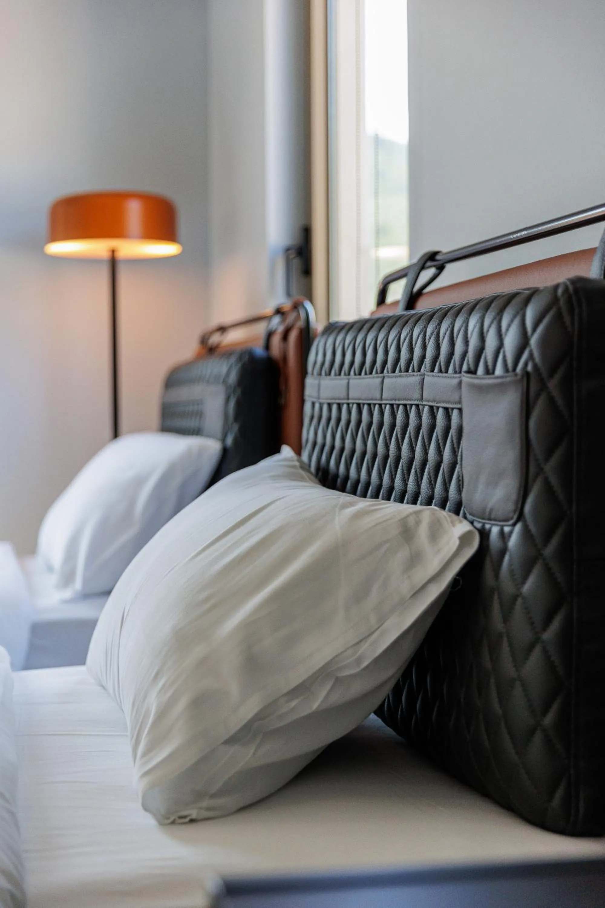 Bed in Hotel Kadmo by Aycon