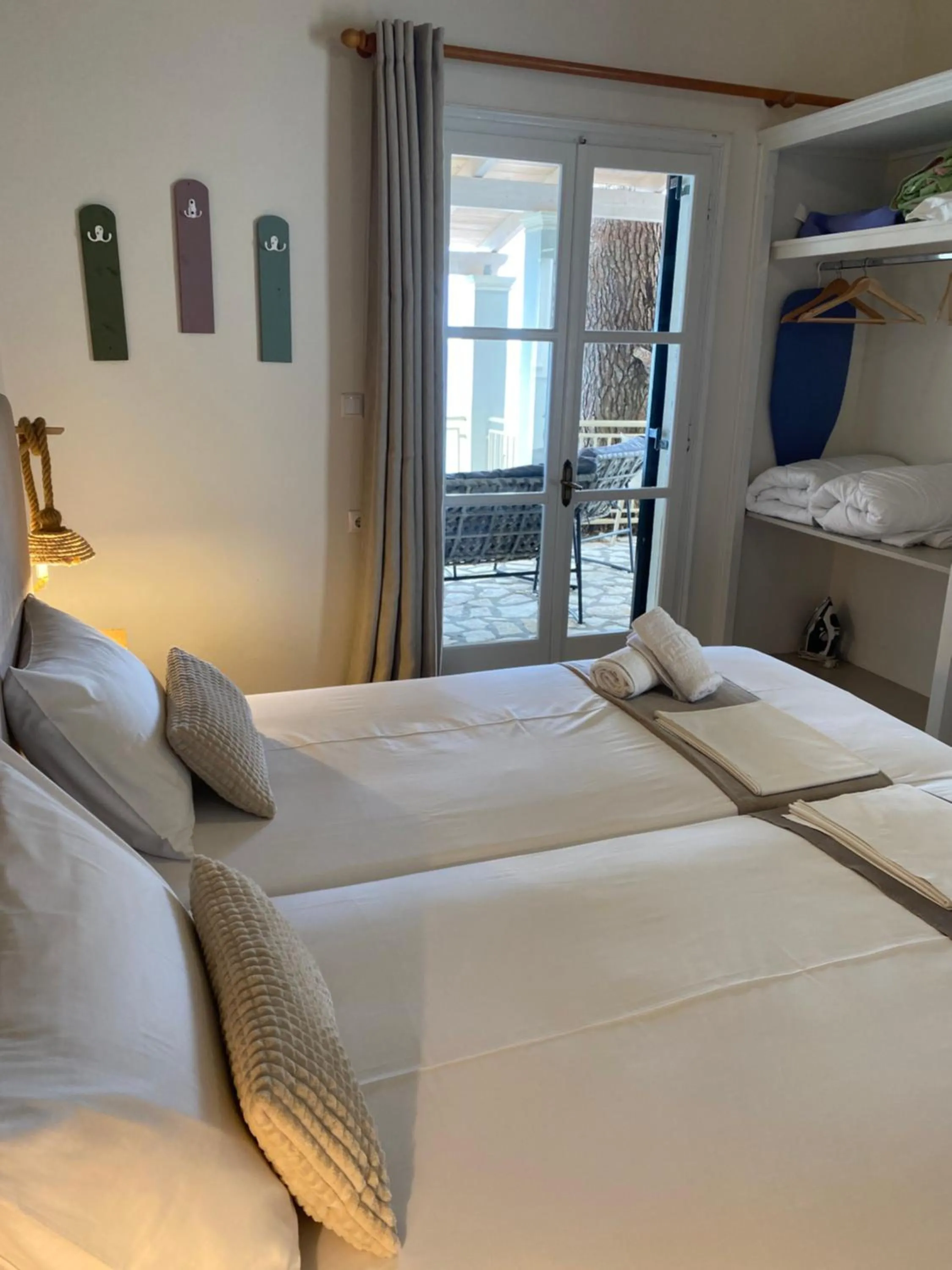 Bed in Vicky's Panoramic View Apartments