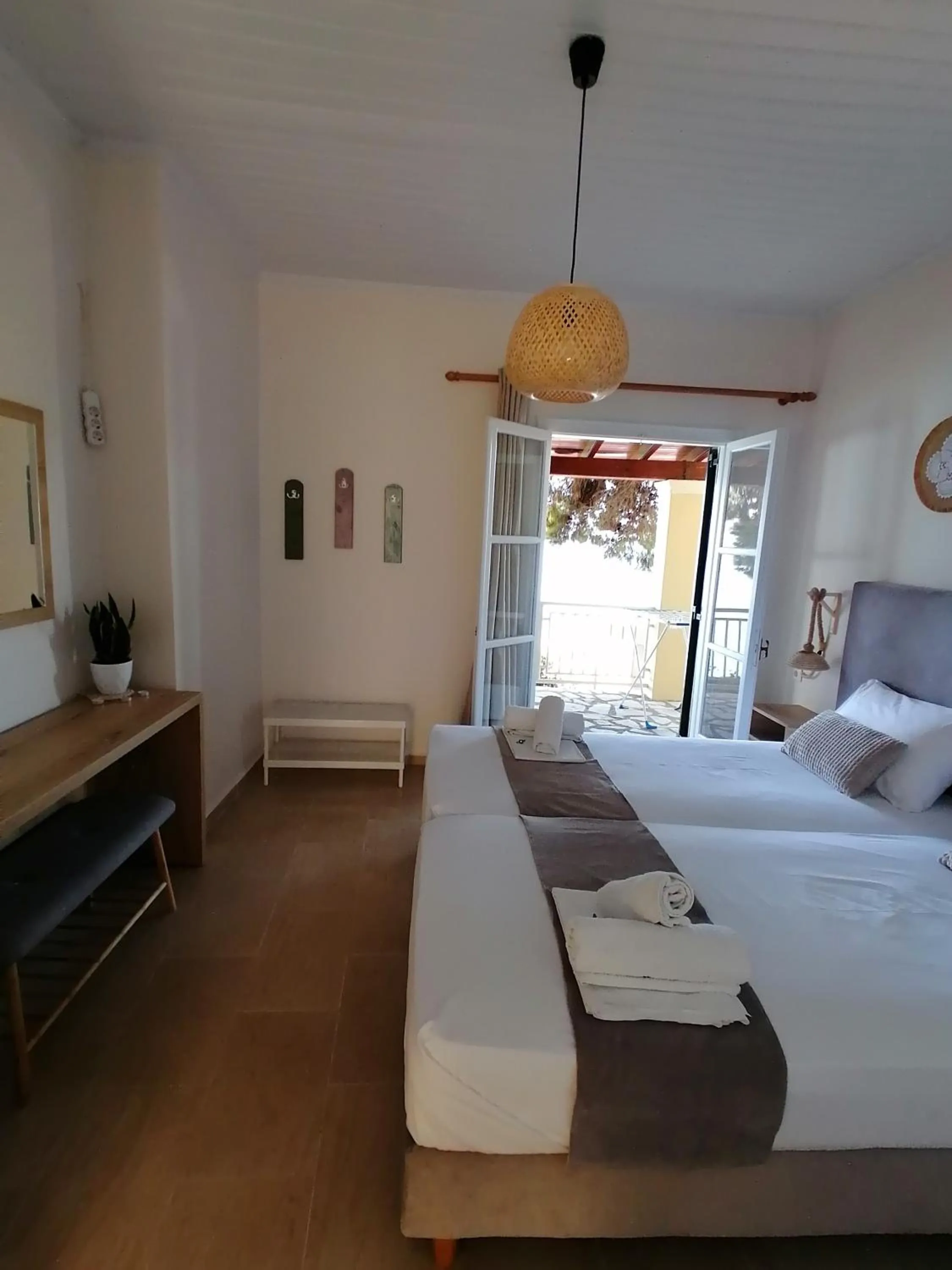 Bed in Vicky's Panoramic View Apartments