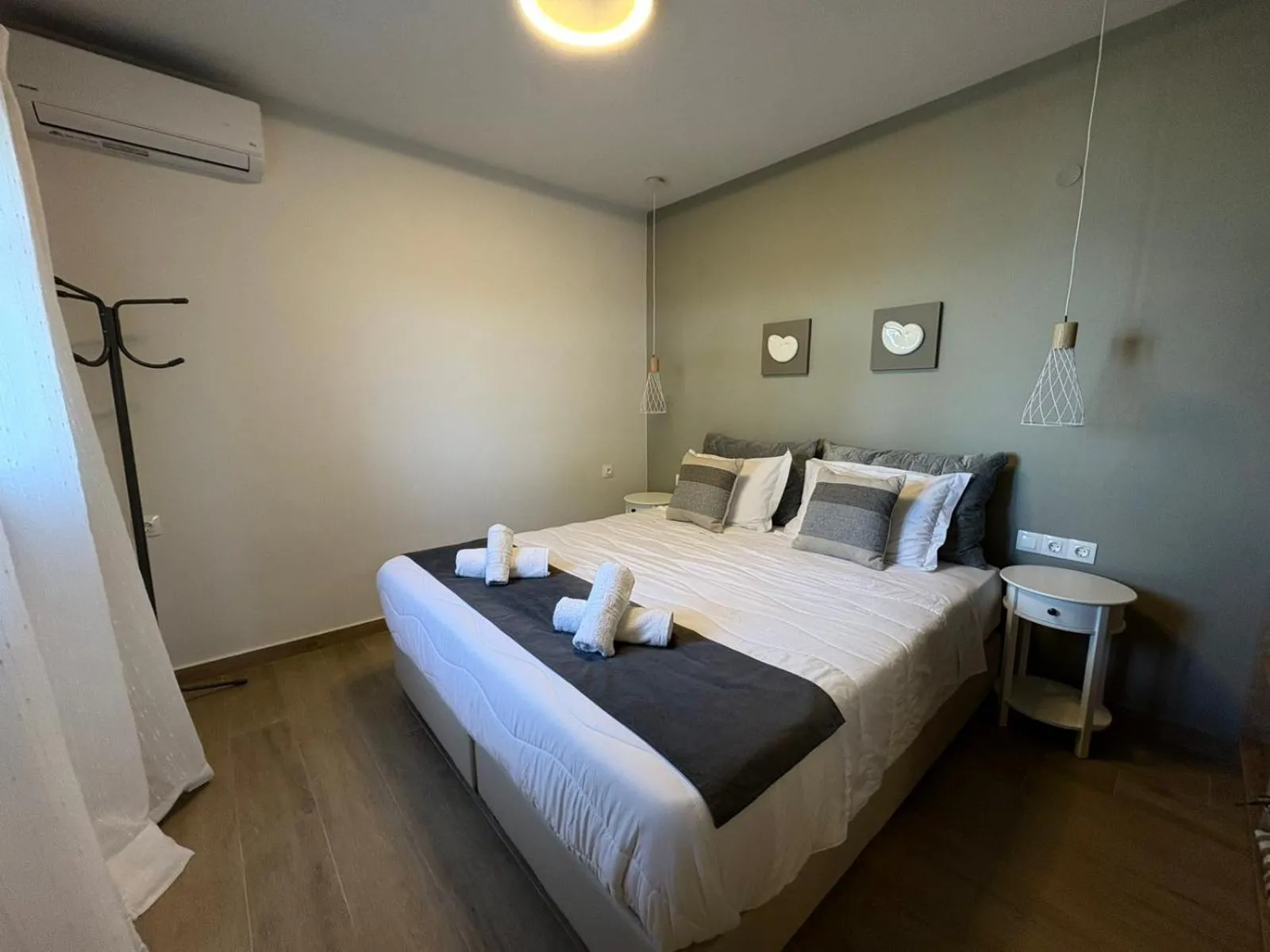 Bed in Vicky's Panoramic View Apartments