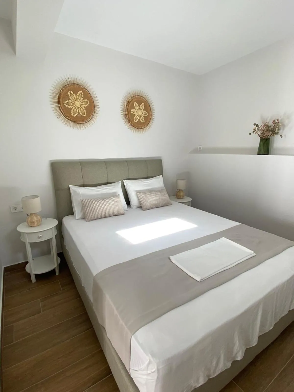 Bed in Vicky's Panoramic View Apartments