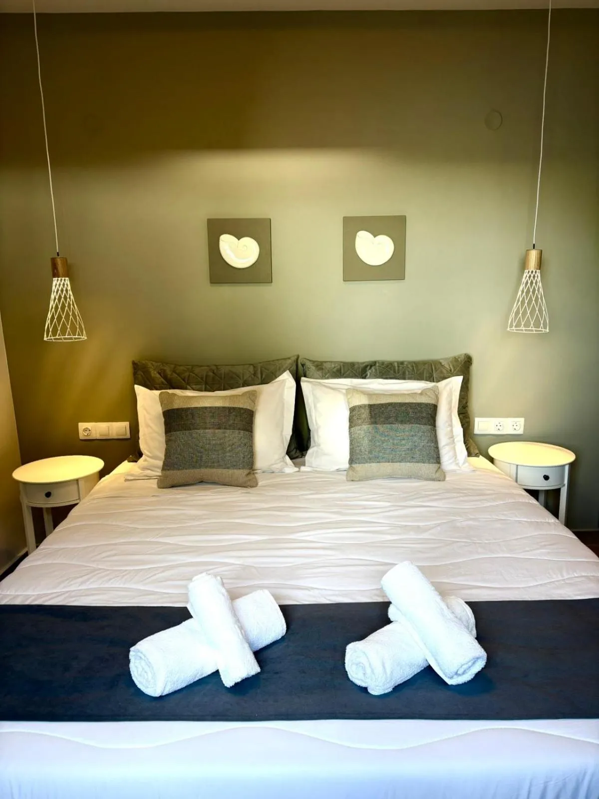 Bed in Vicky's Panoramic View Apartments