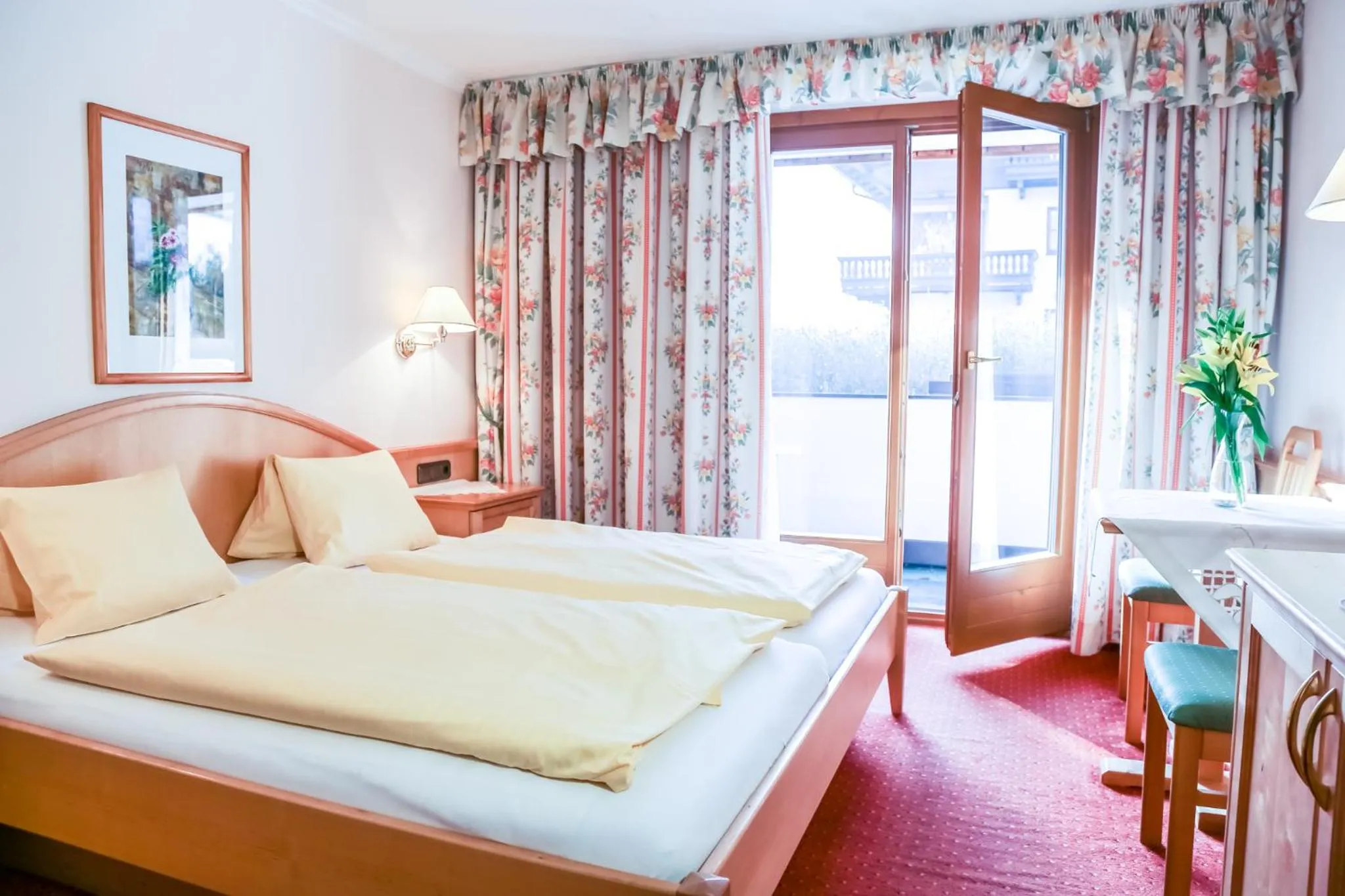 Photo of the whole room, Bed in Gasthof Simmerlwirt