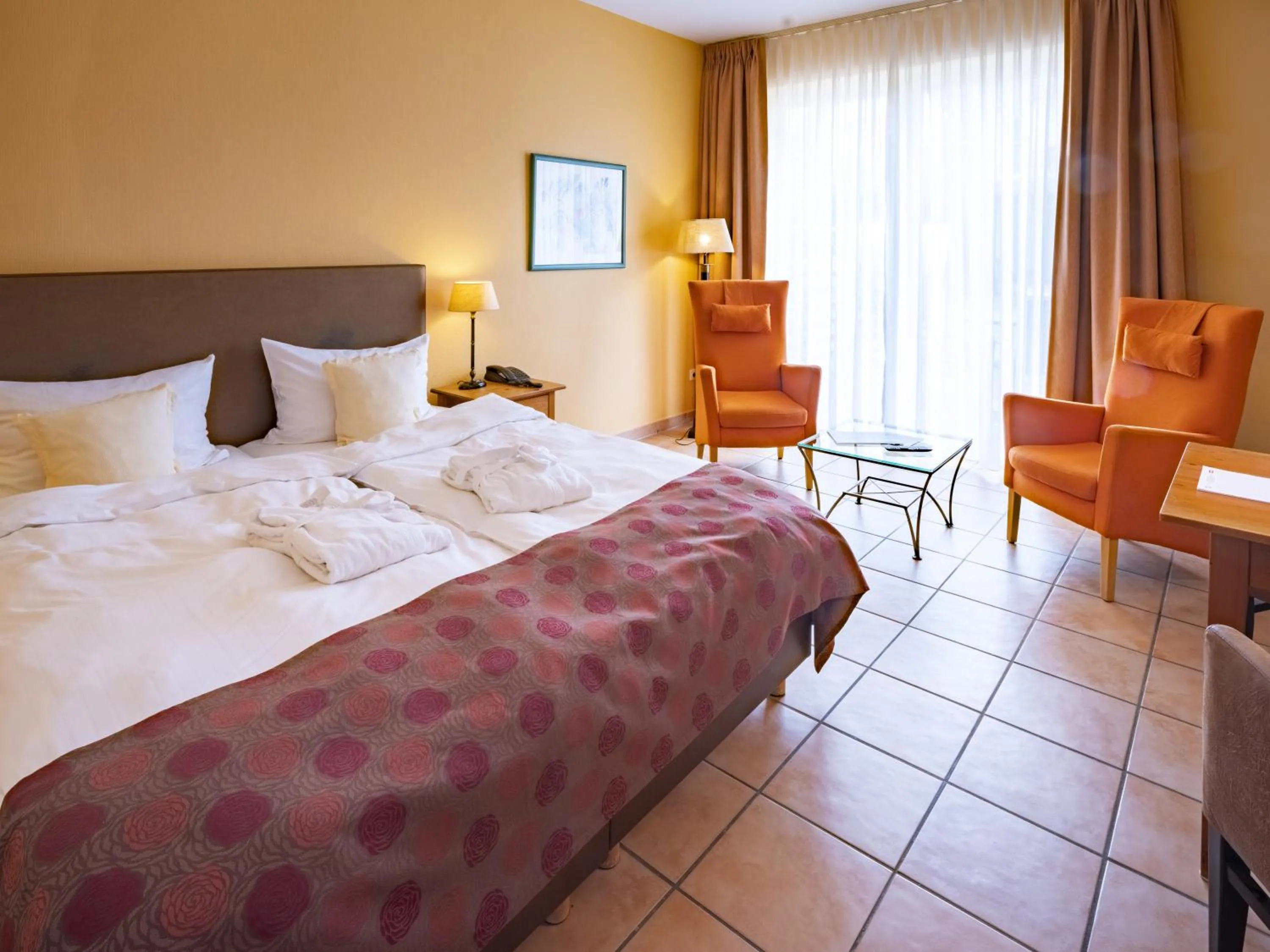 Photo of the whole room, Bed in Hotel Hüttmann