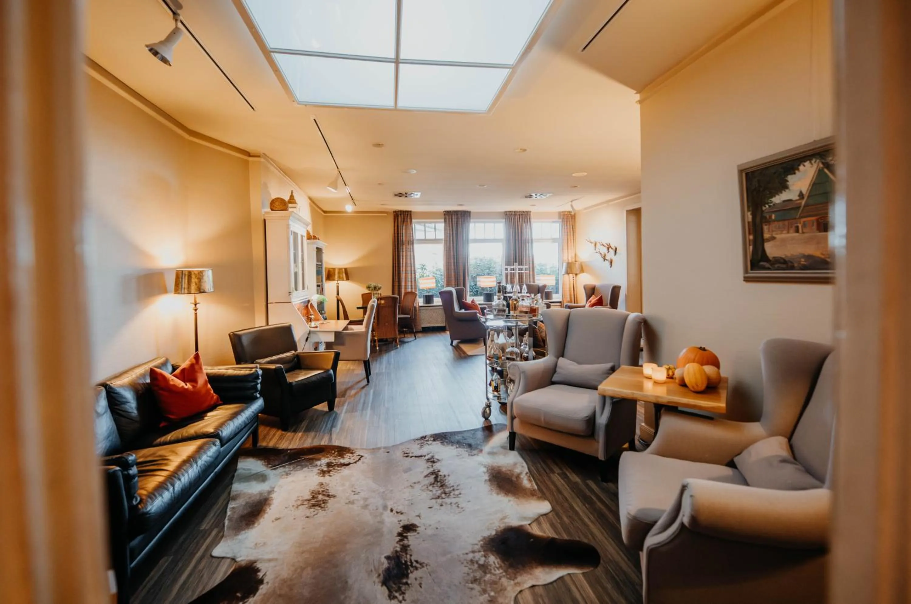 Communal lounge/ TV room in Hotel Hüttmann