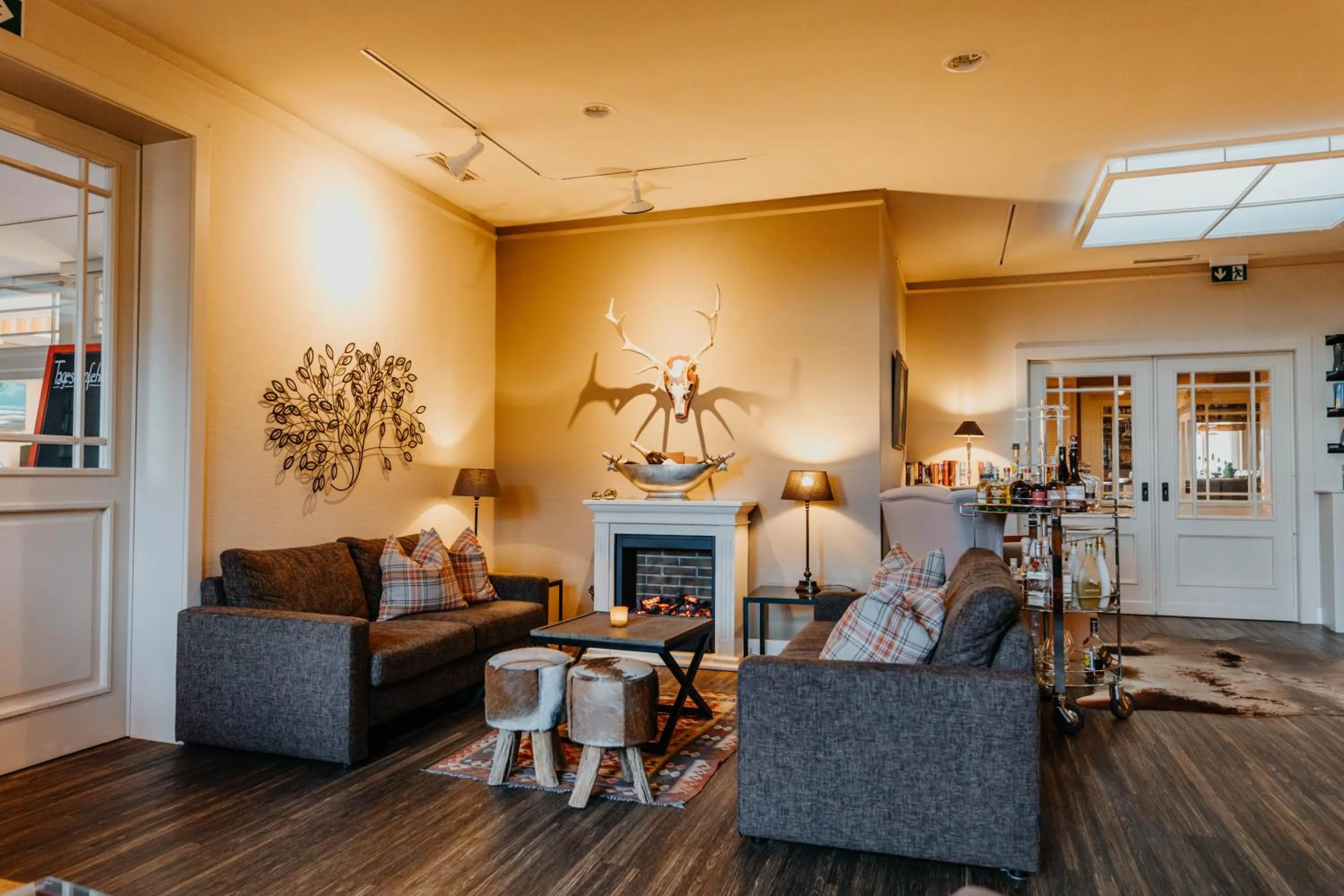 Communal lounge/ TV room in Hotel Hüttmann