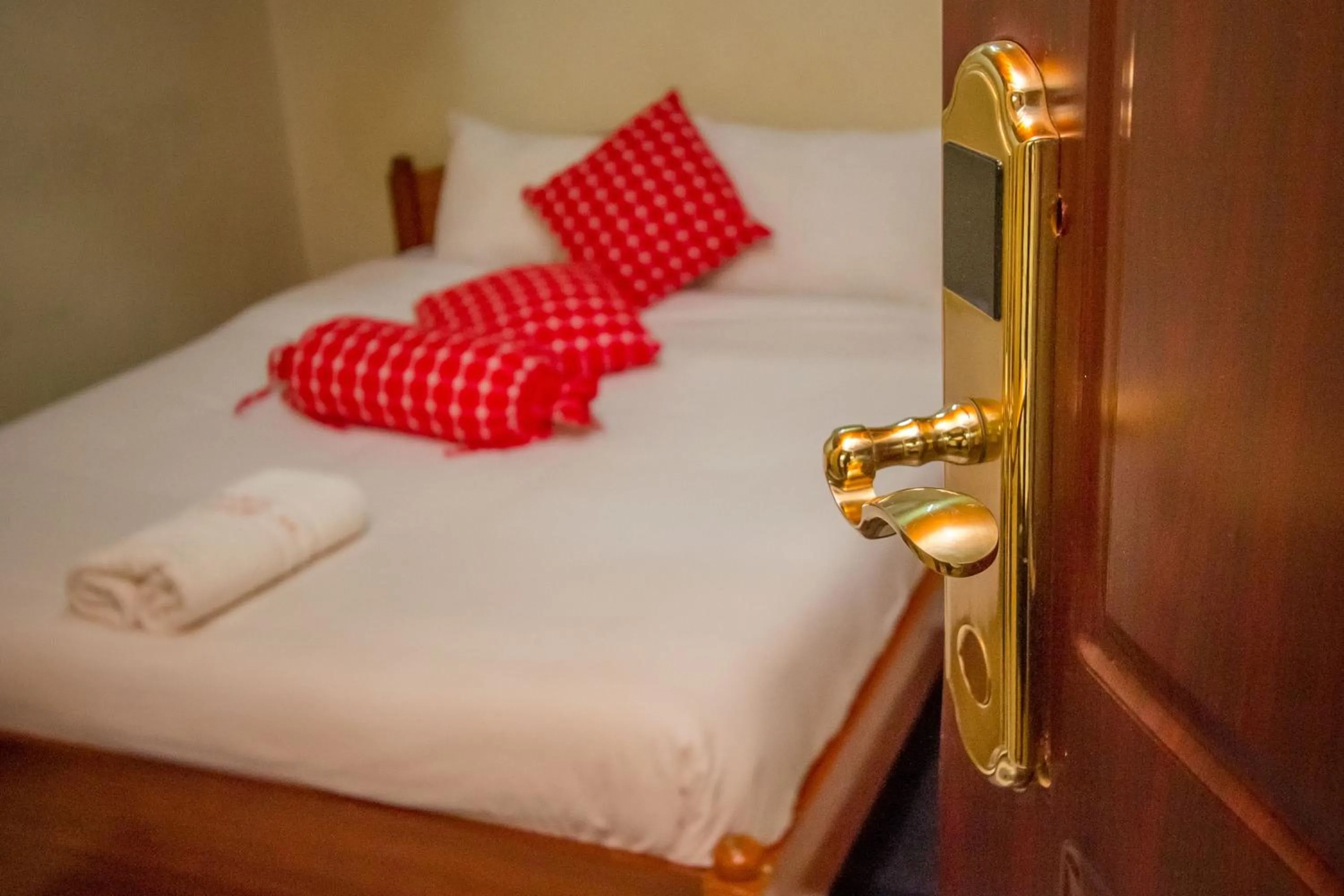 Bed in Sunshine Hotel Tengecha